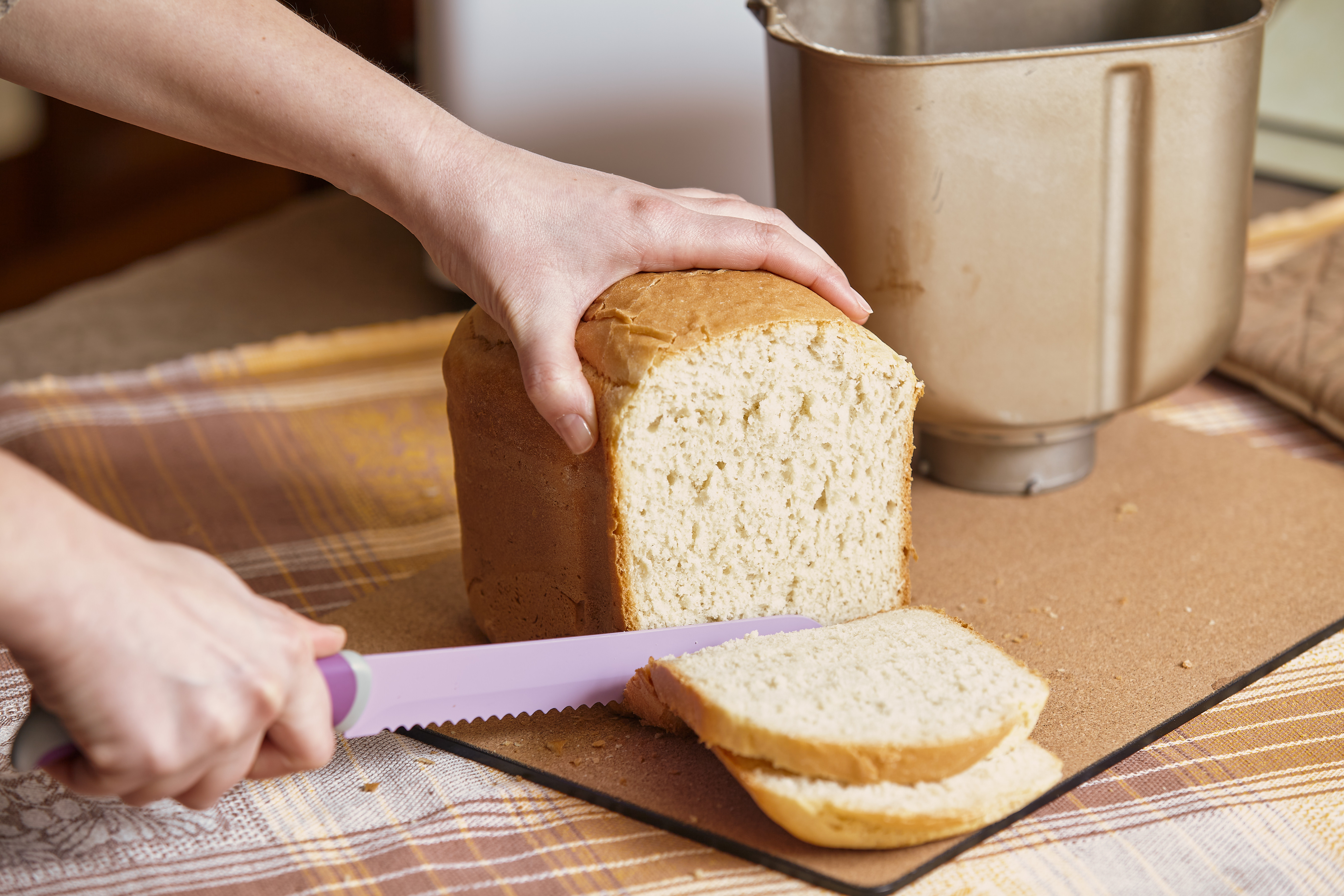 Making bread at home is made super easy with a breadmaker. Photo / 123rf