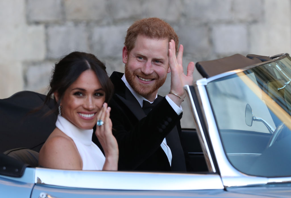 Prince Harry and Meghan with her aquamarine ring after their wedding in 2018. Photo / Getty Images