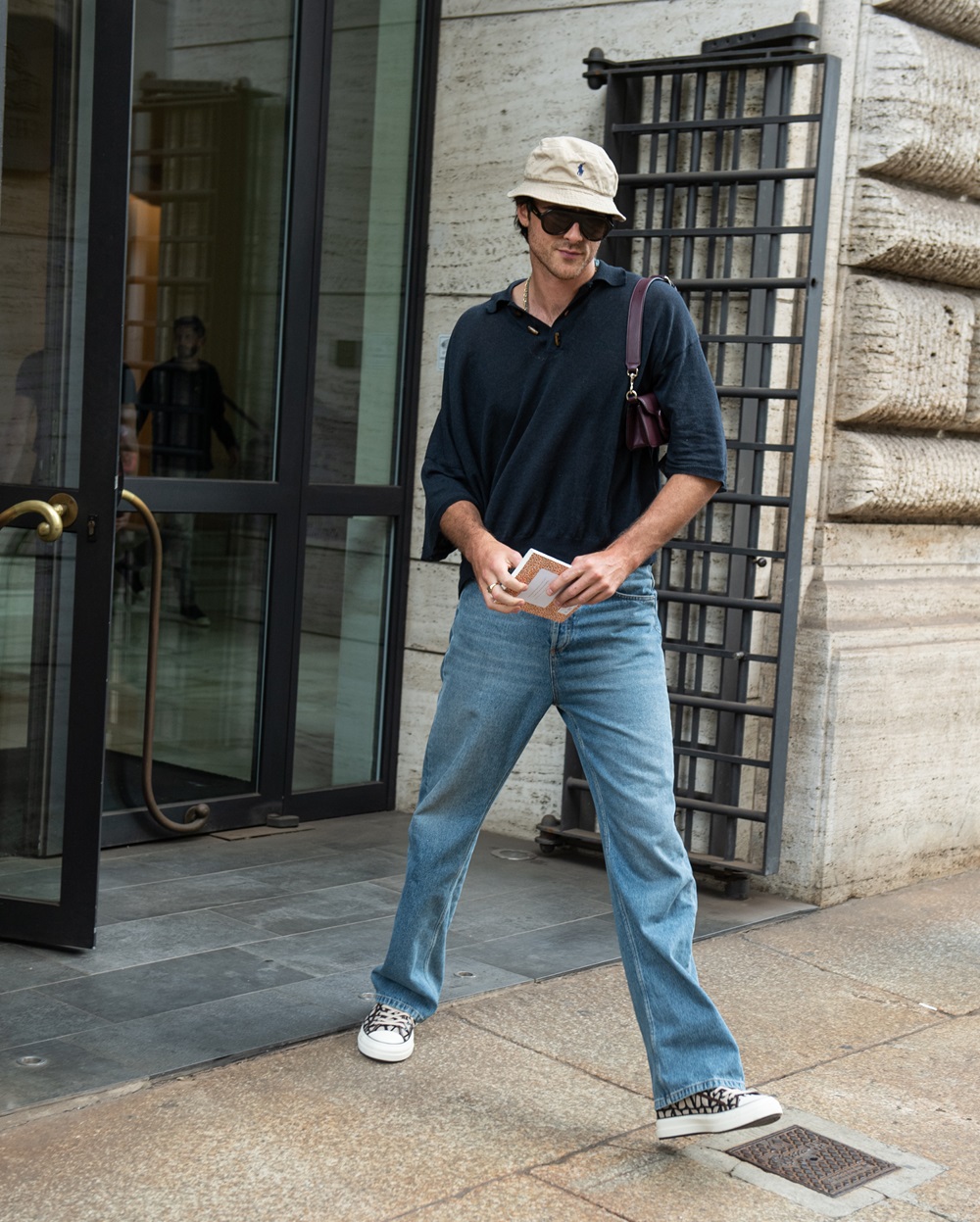 Jacob Elordi tucked a Coach baguette bag under his arm in Milan last year. Photo / Getty Images