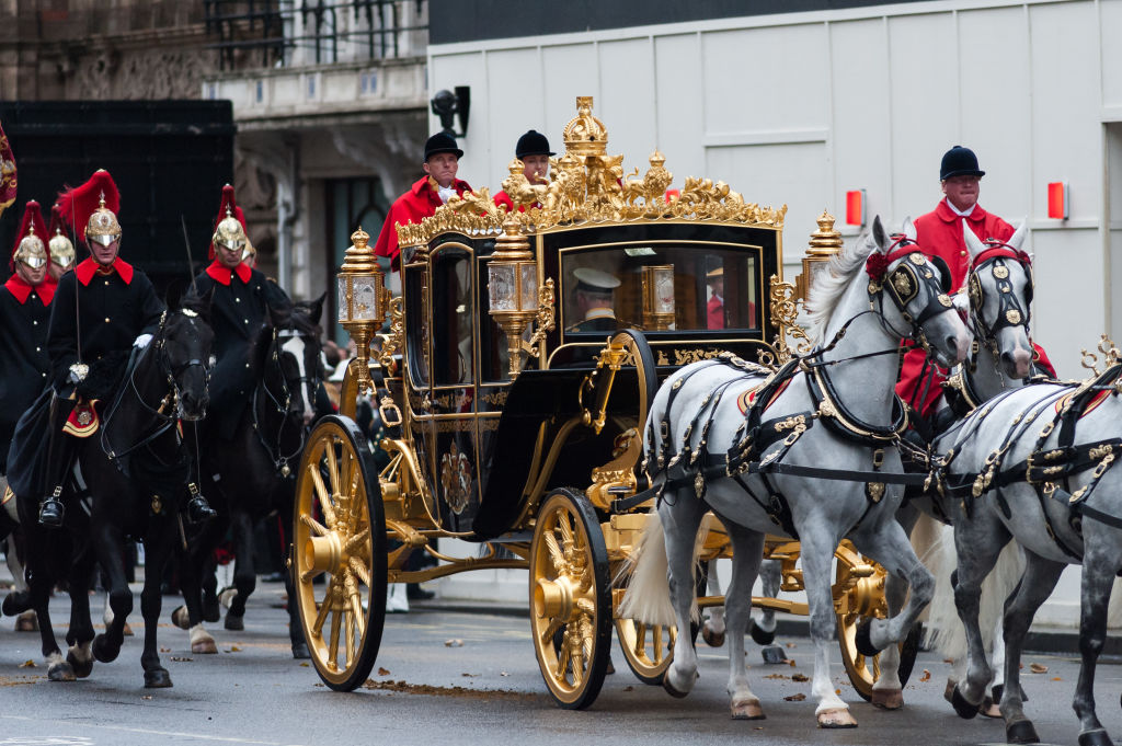 Queen Elizabeth II rides in the Diamond Jubilee State Coach to the State Opening of Parliament in 2019. Photo / Getty Images