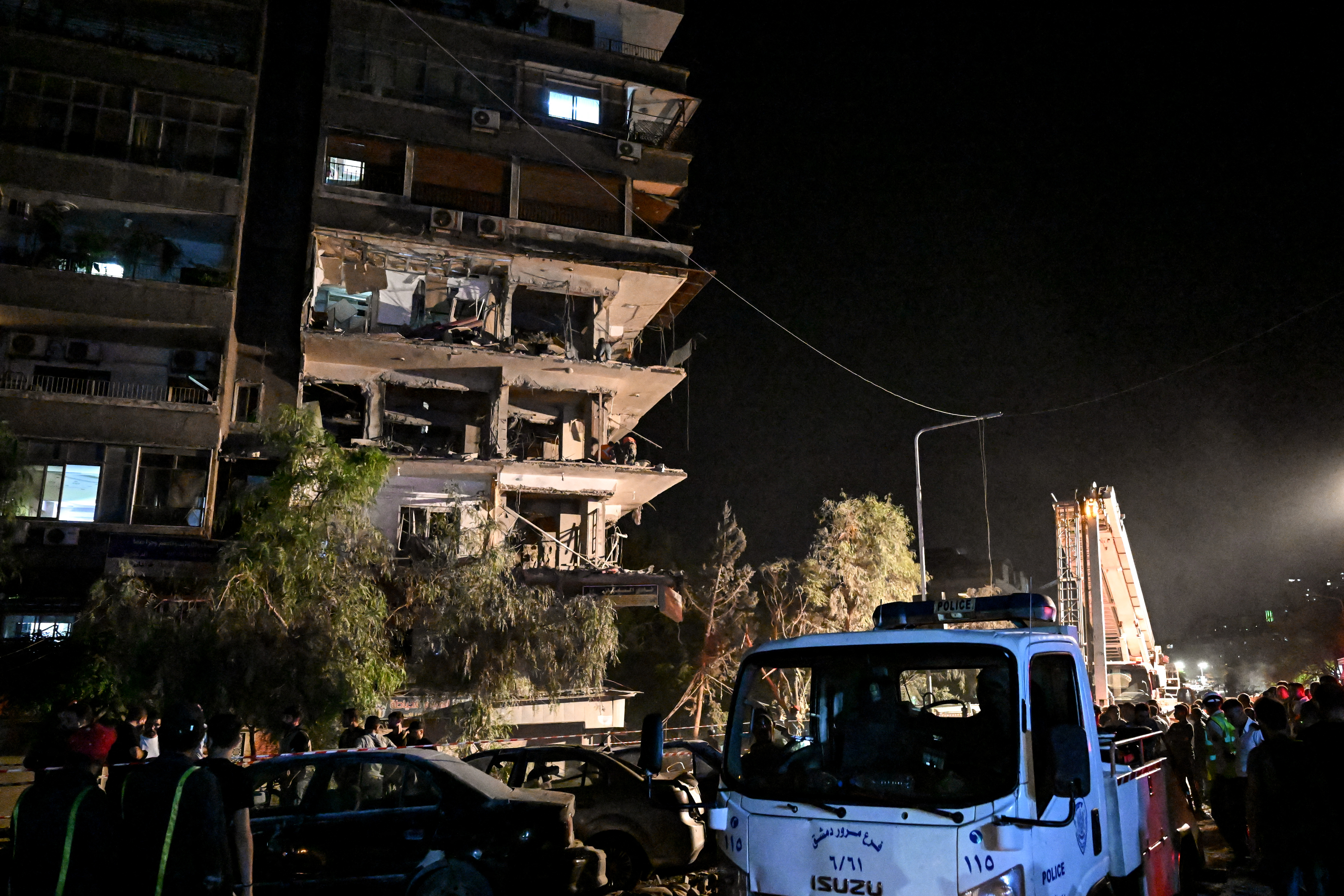 A residential building hit by a reported Israeli air strike, in the Mazzeh suburb on the western outskirts of Syria's capital Damascus on October 8. The Syrian defence ministry said seven people, including women and children, were killed. Photo / AFP