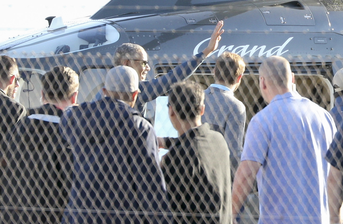 US President Barack Obama waves from Mechanics Bay. Photo / Greg Bowker 