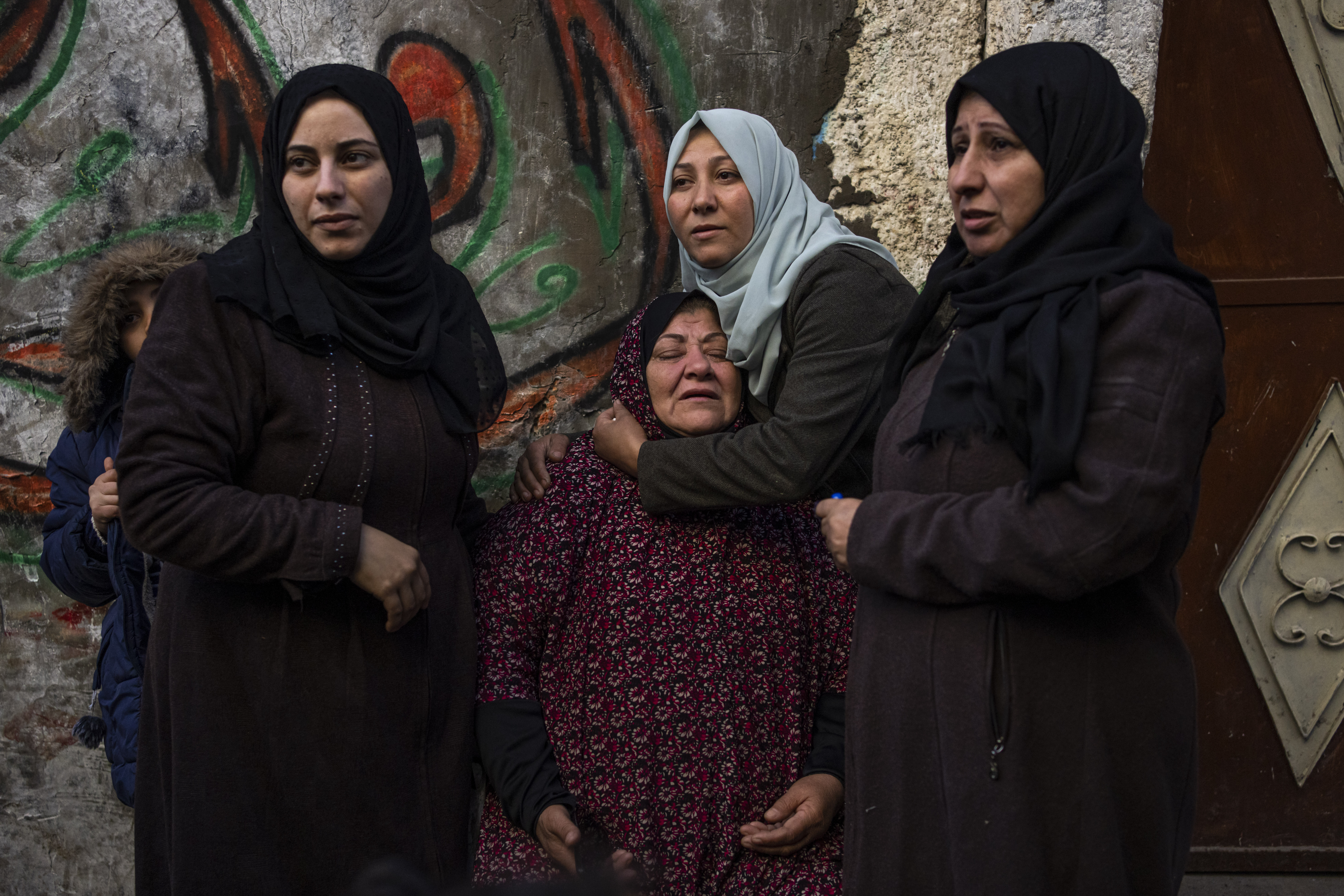 Palestinian women react after their home was hit by an Israeli strike in Rafah, southern Gaza Strip. Photo / AP