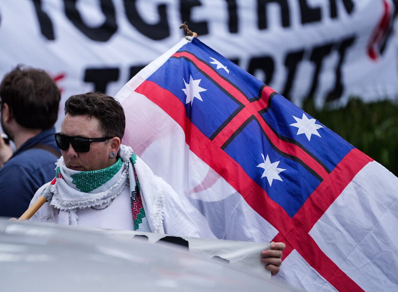 A man outside the Act offices in Epsom protesting against the introduction of the Treaty Principles Bill in Parliament. Photo / Carson Bluck