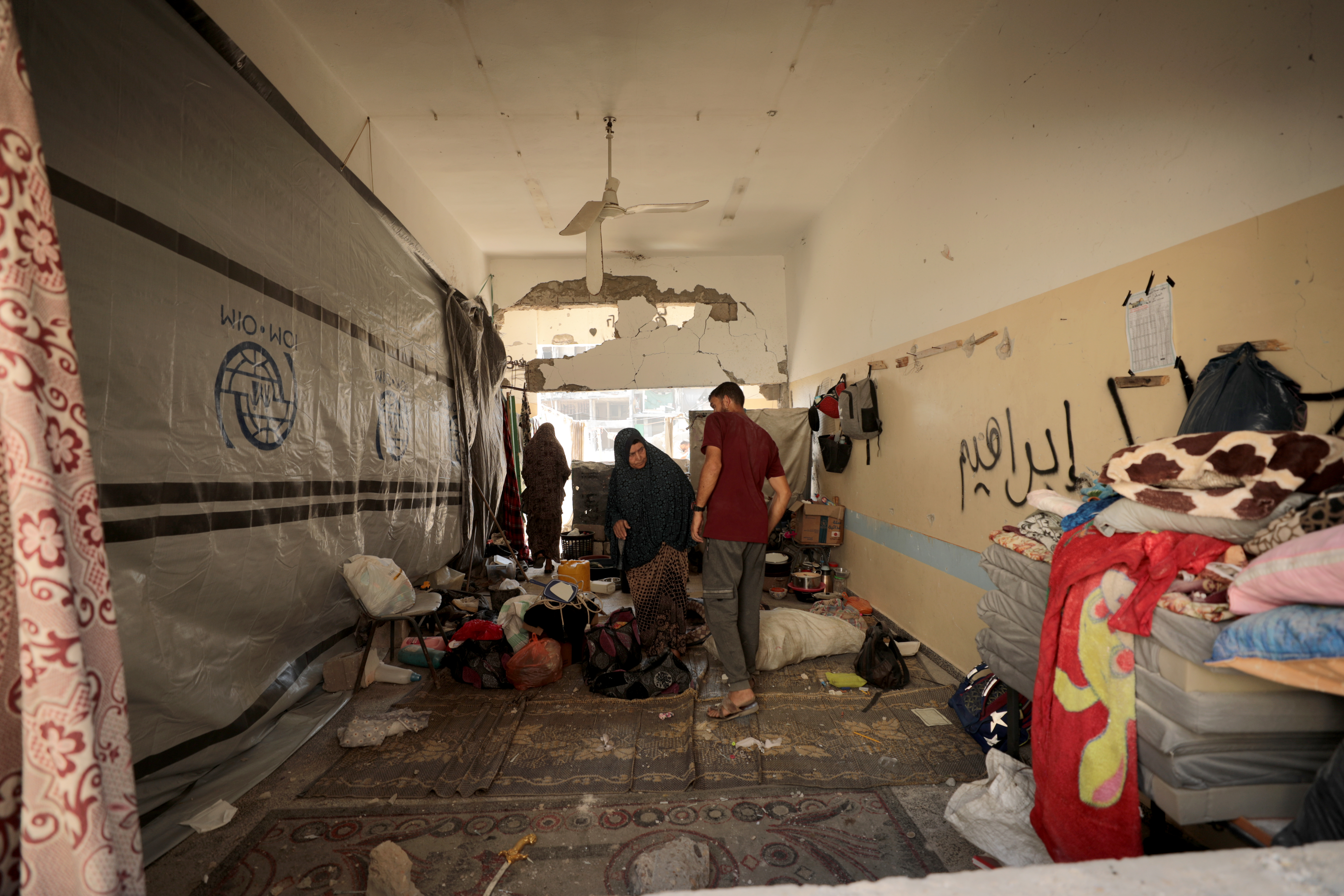 Palestinians inspect the area after Israeli attack hit al-Zahraa School in the east of Gaza City, Gaza on August 8, 2024. Photo / Anadolu via Getty Images