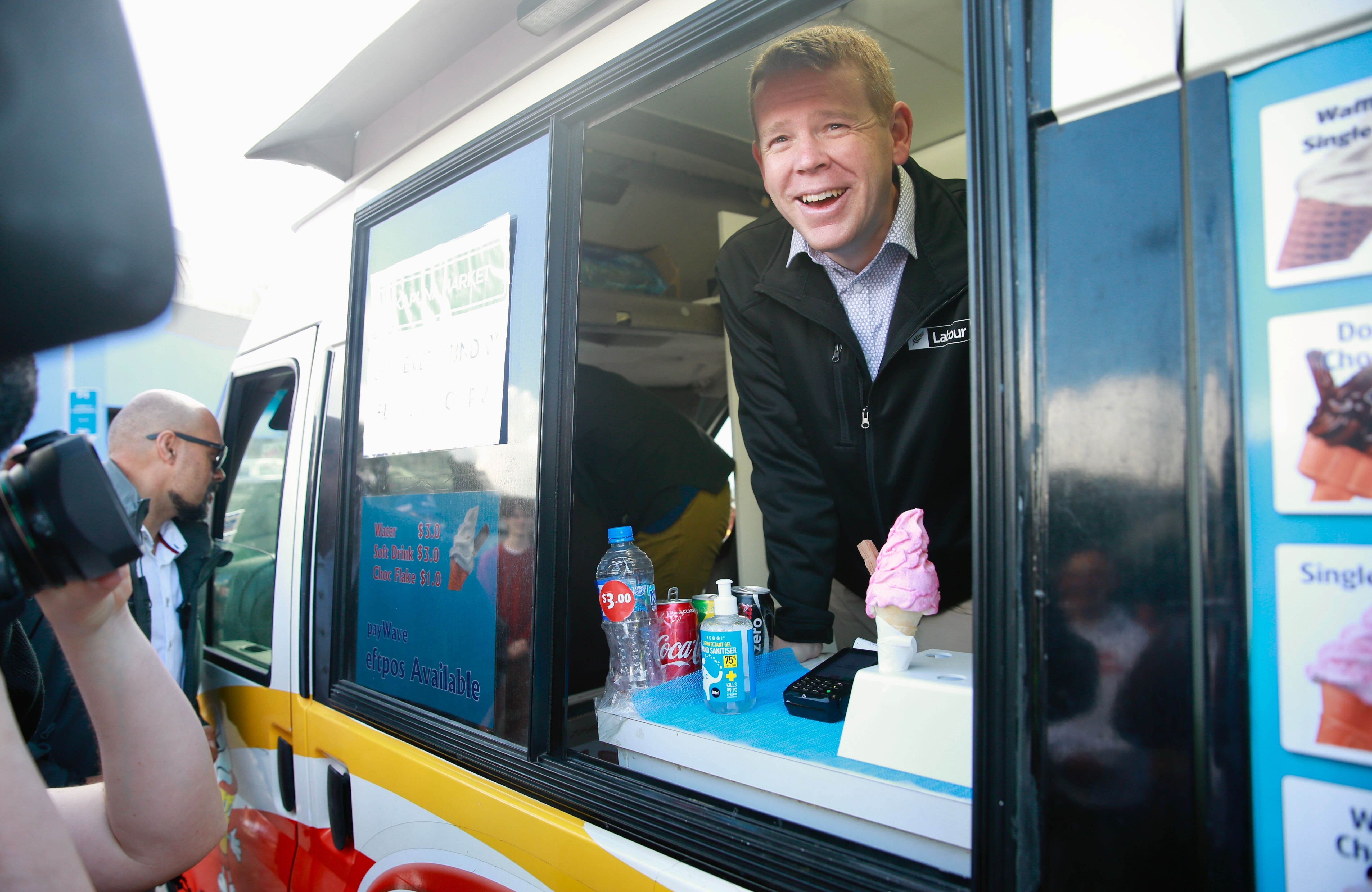 Labour leader Chris Hipkins serves ice cream from a Mr Whippy truck in Takapuna. Photo / Alex Burton