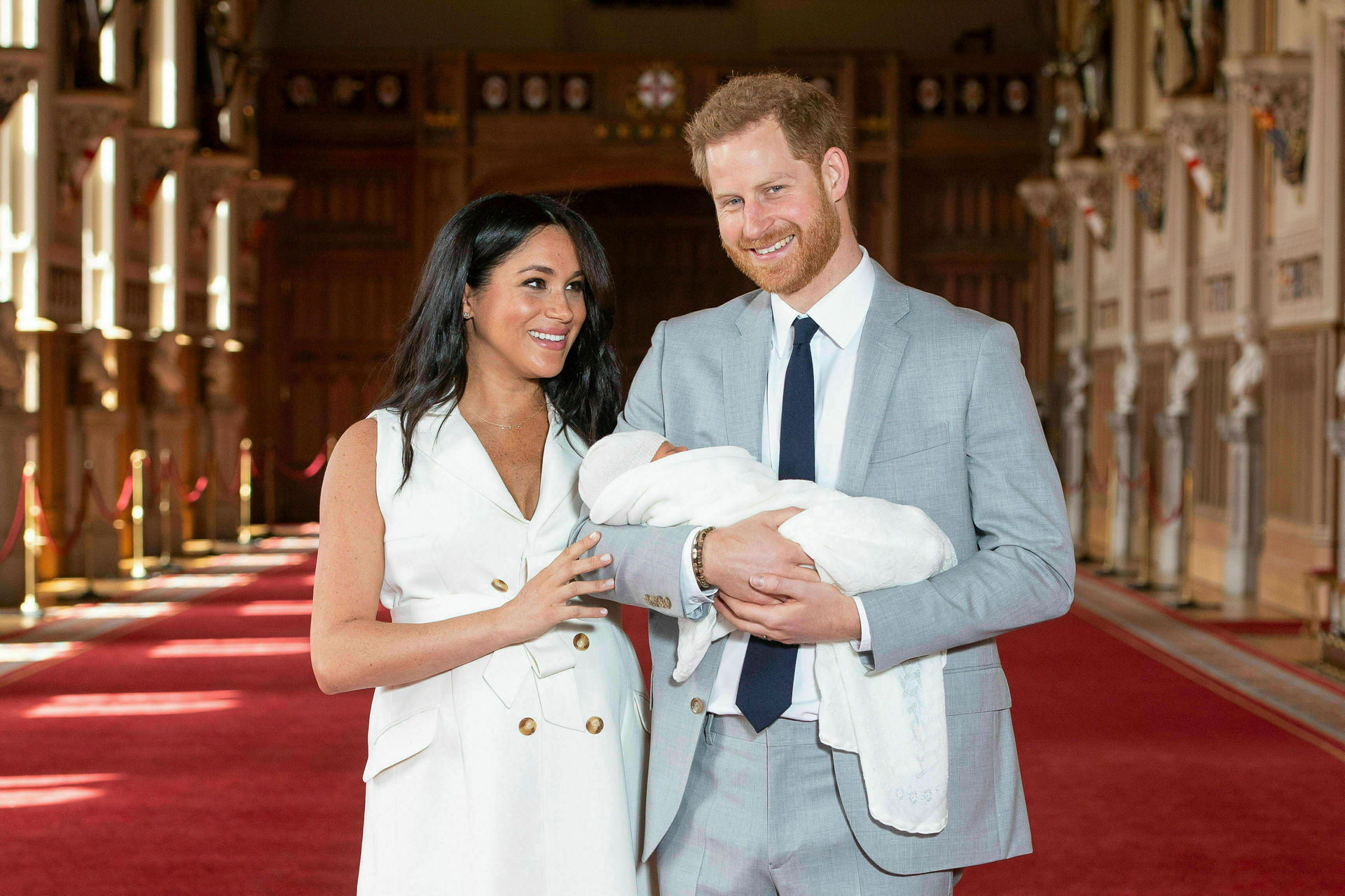 Prince Harry and Meghan, Duchess of Sussex, pose during a photocall with their son Archie, in St George's Hall at Windsor Castle. Photo / AP
