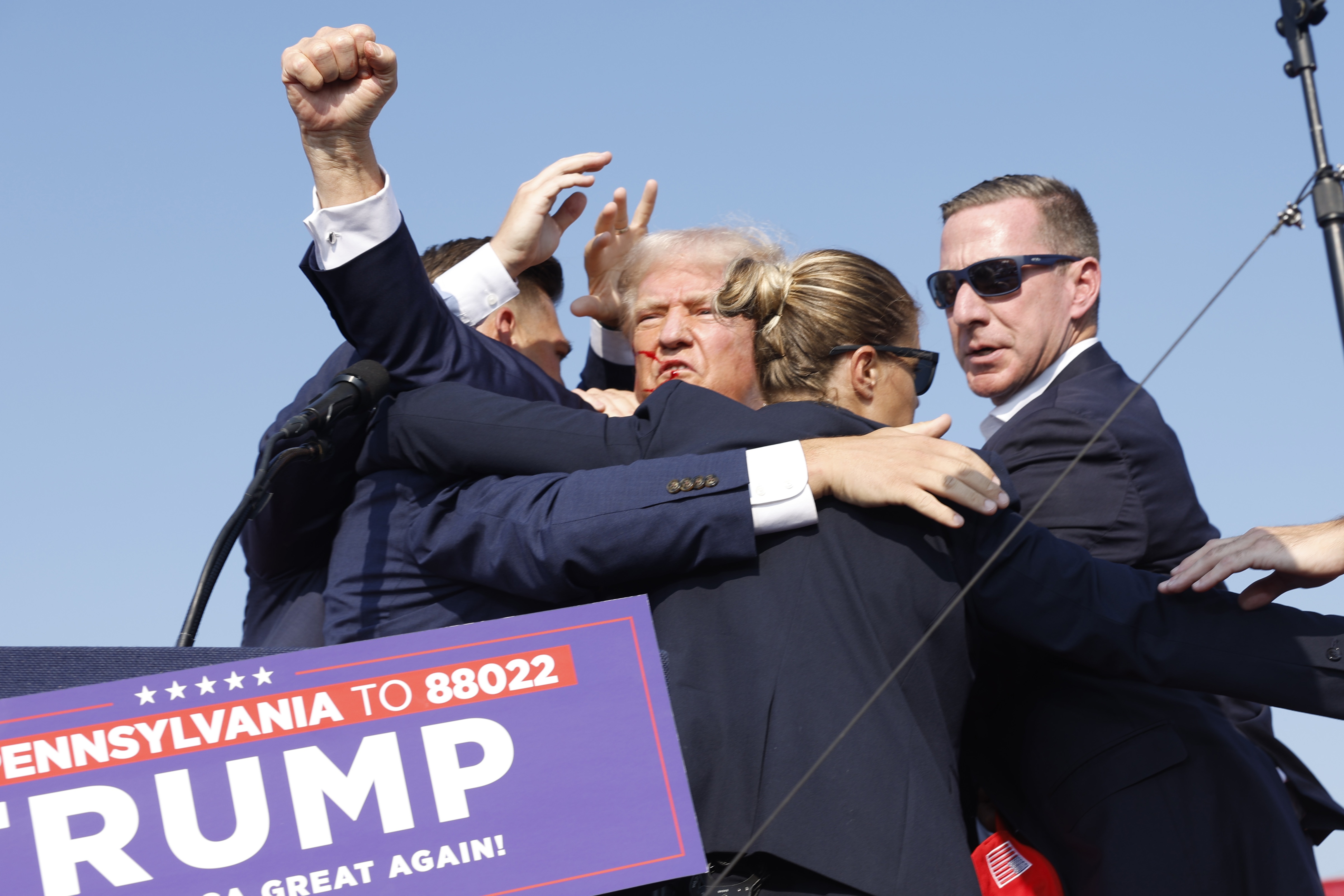 Republican presidential candidate former President Donald Trump is rushed offstage during a rally on July 13 in Butler, Pennsylvania. (Photo by Anna Moneymaker/Getty Images)