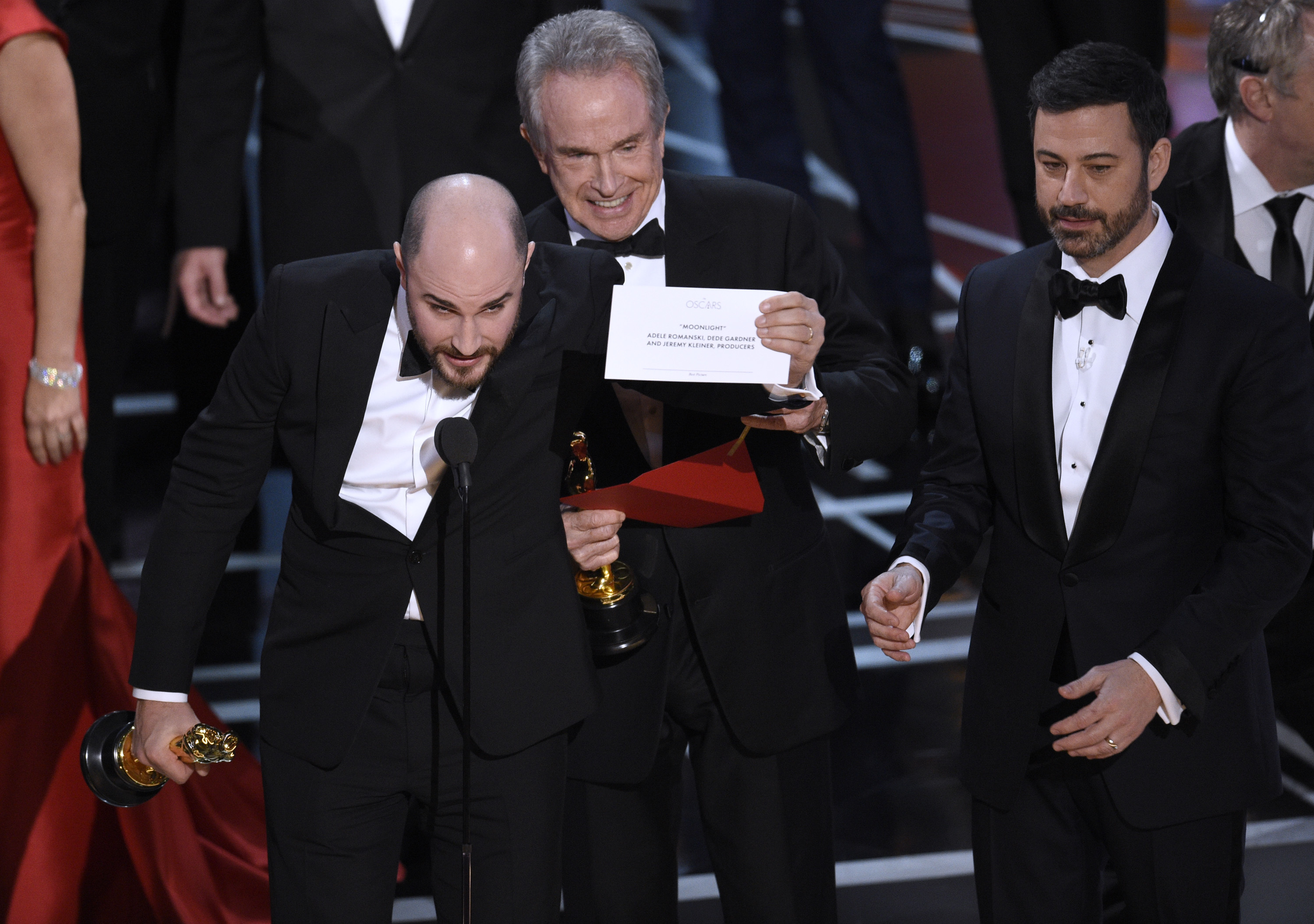 Jordan Horowitz, producer of La La Land, shows the envelope revealing Moonlight as the true winner of best picture at the Oscars. Photo / AP