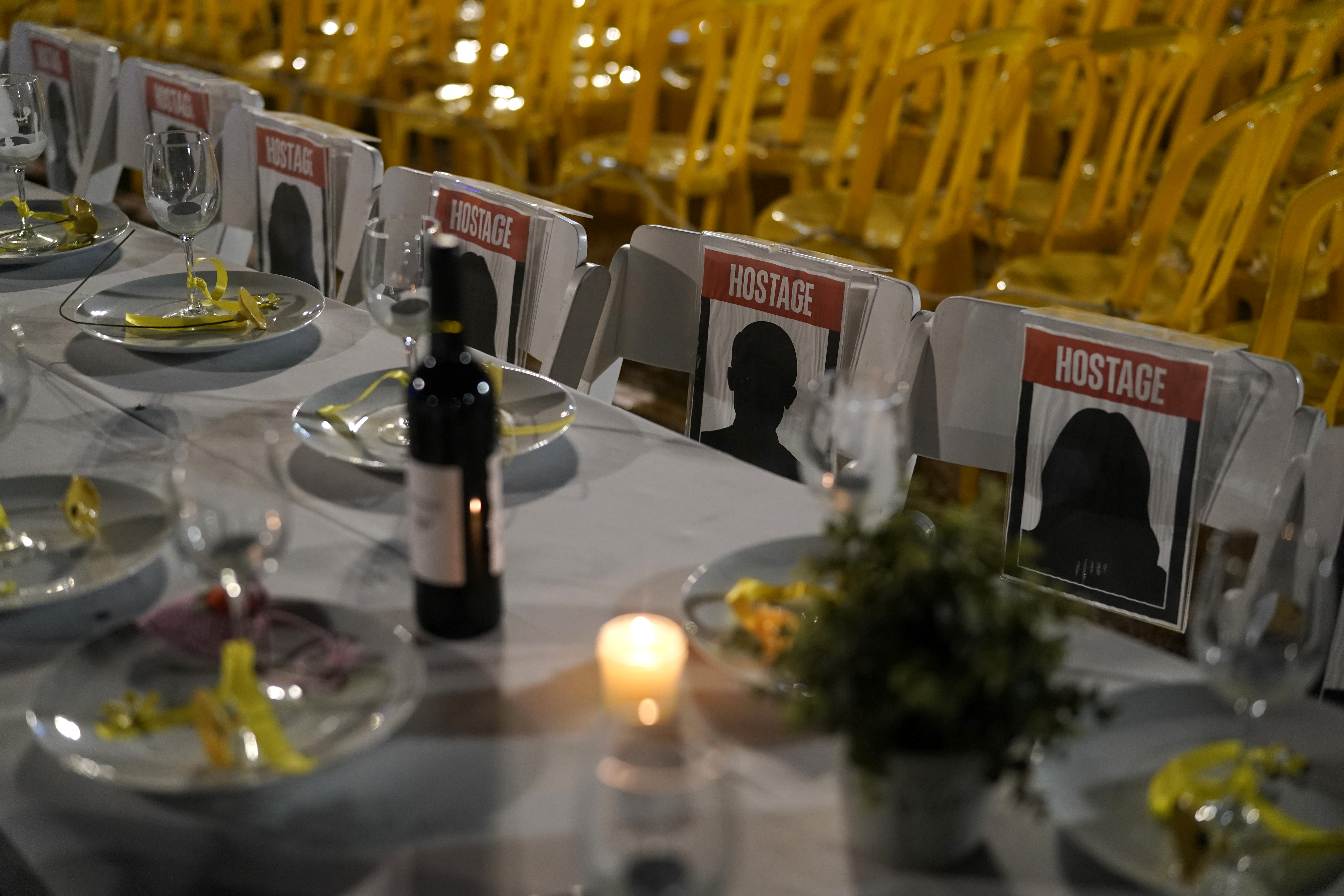 A table is set for hostages being held in the Gaza Strip, in a show of solidarity, in Tel Aviv, Israel. Photo / AP