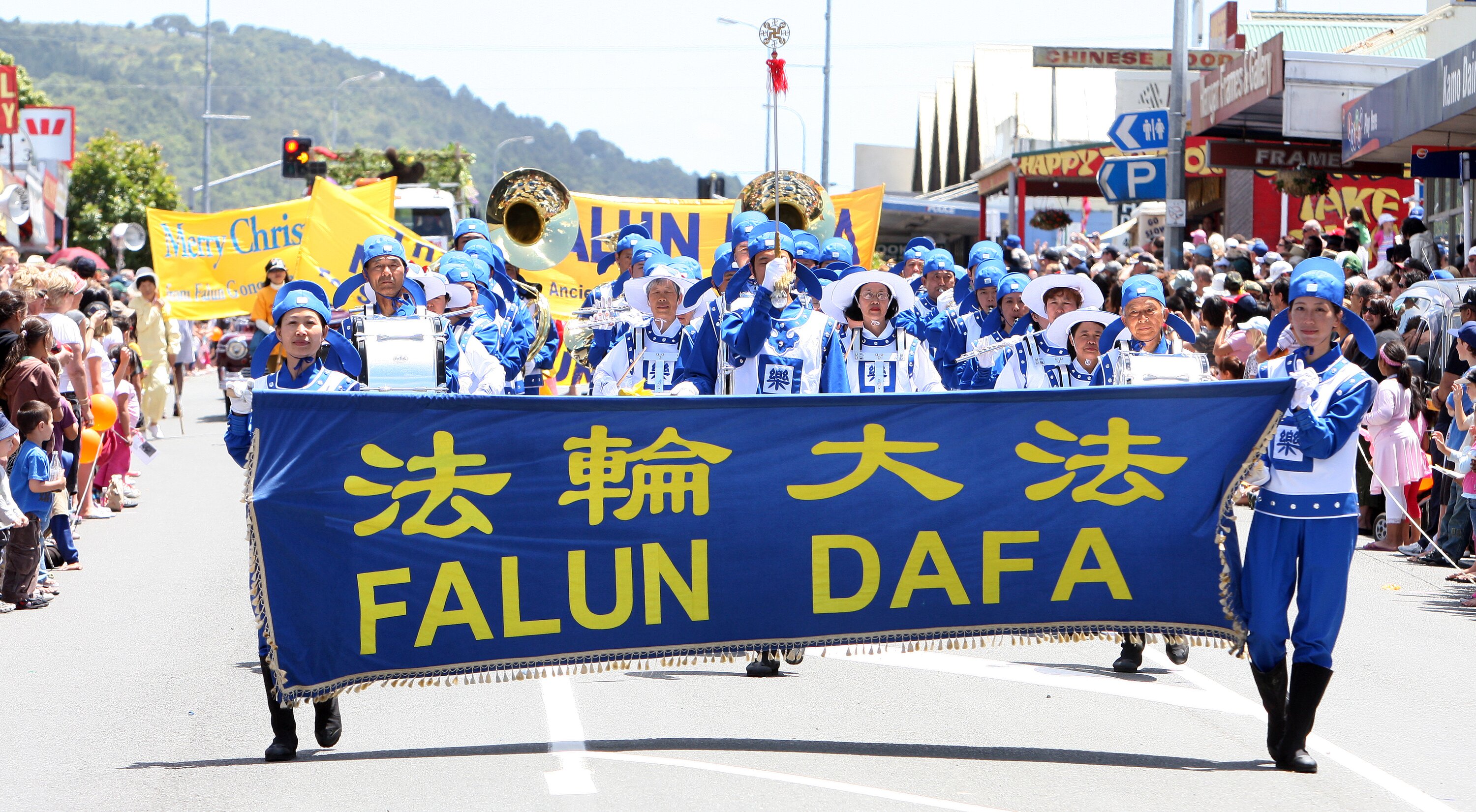 Spiritual group Falun Gong, also known as Falun Dafa, participating in a Christmas Parade in the Whangārei suburb of Kamo.