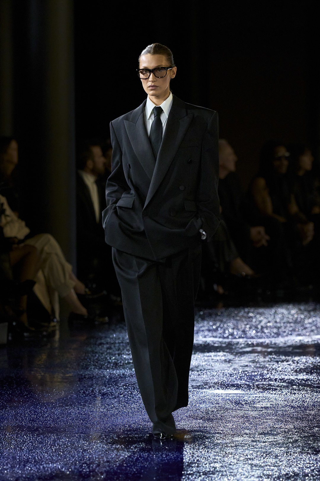 Bella Hadid walks the runway at the Paris Fashion Week show, a collection that was an ode to the legendary Yves Saint Laurent.