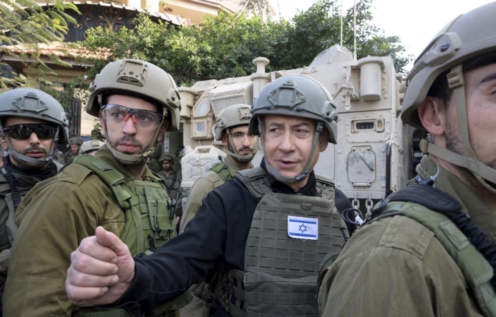 Israeli Prime Minister Benjamin Netanyahu receives a security briefing with commanders and soldiers in the northern Gaza Strip. Photo / AP