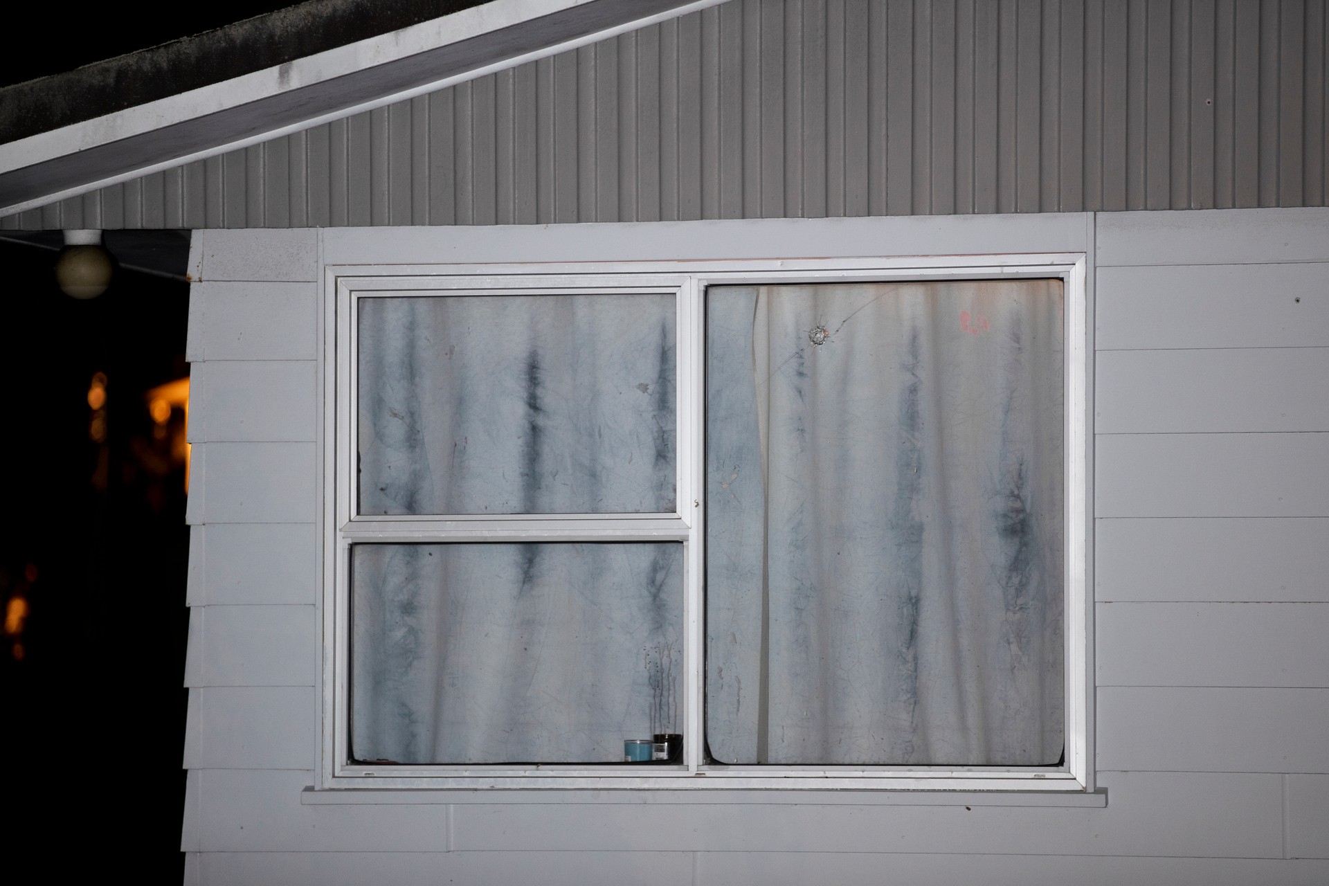 There are signs shots were fired at a Vina Pl home tonight. Photo / Hayden Woodward