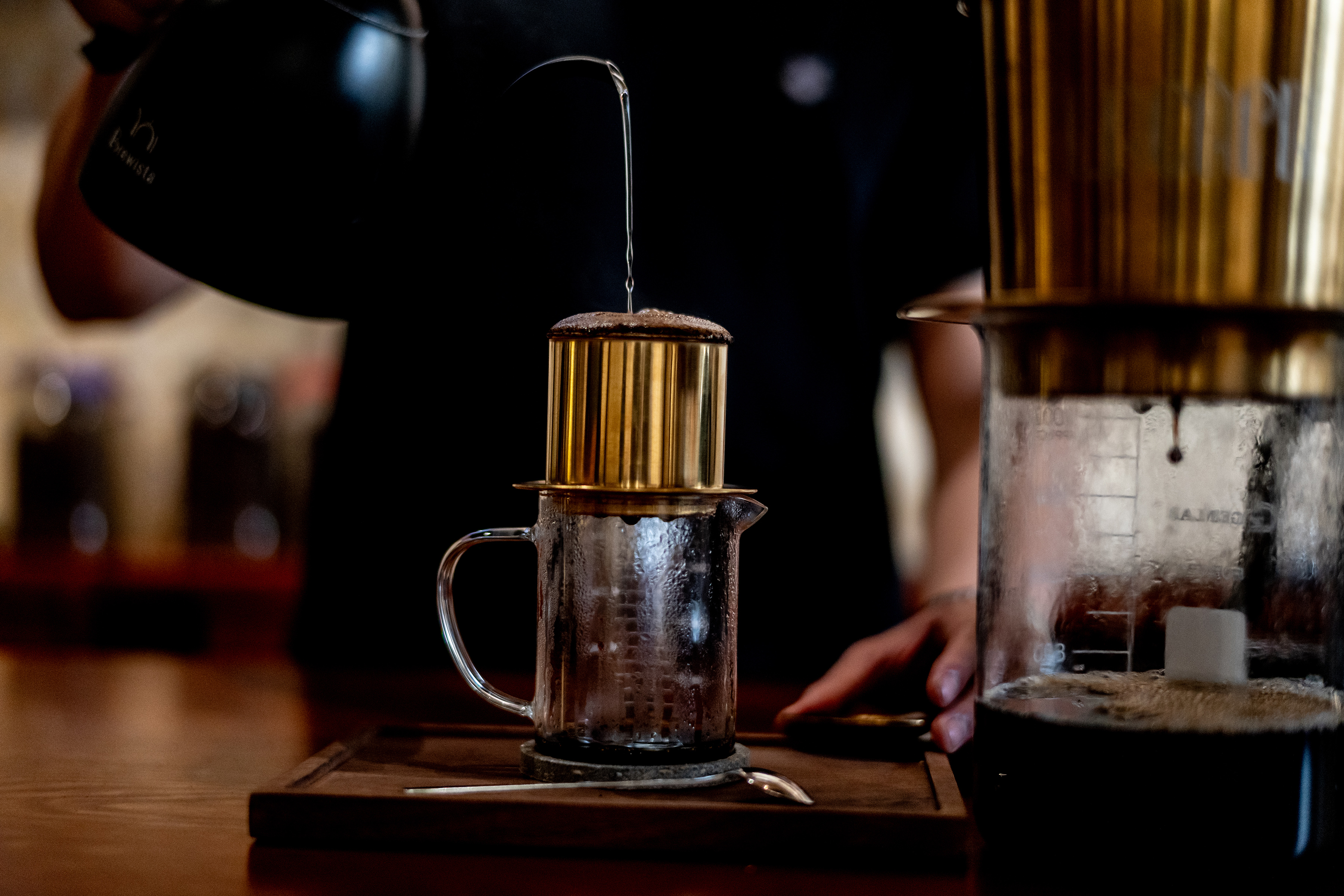 Making coffee at Lacaph, a new coffeehouse in District 1, just off Rach Ben Nghe, the slim urban canal that snakes through Ho Chi Minh City, Vietnam, in February 2024. Photo / Justin Mott, The New York Times