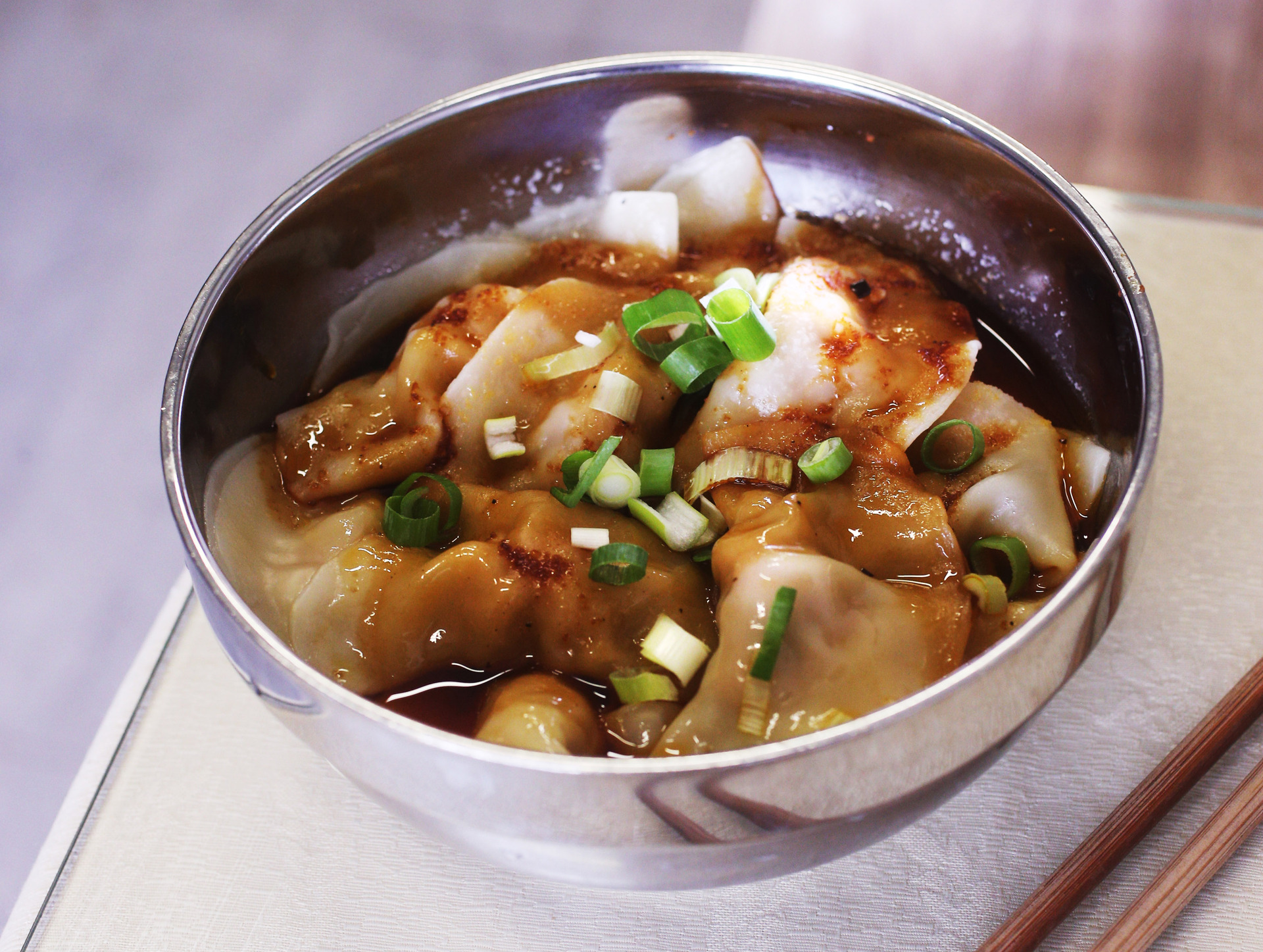 Dumplings in spicy sauce at Eden Noodles. Photo / Doug Sherring