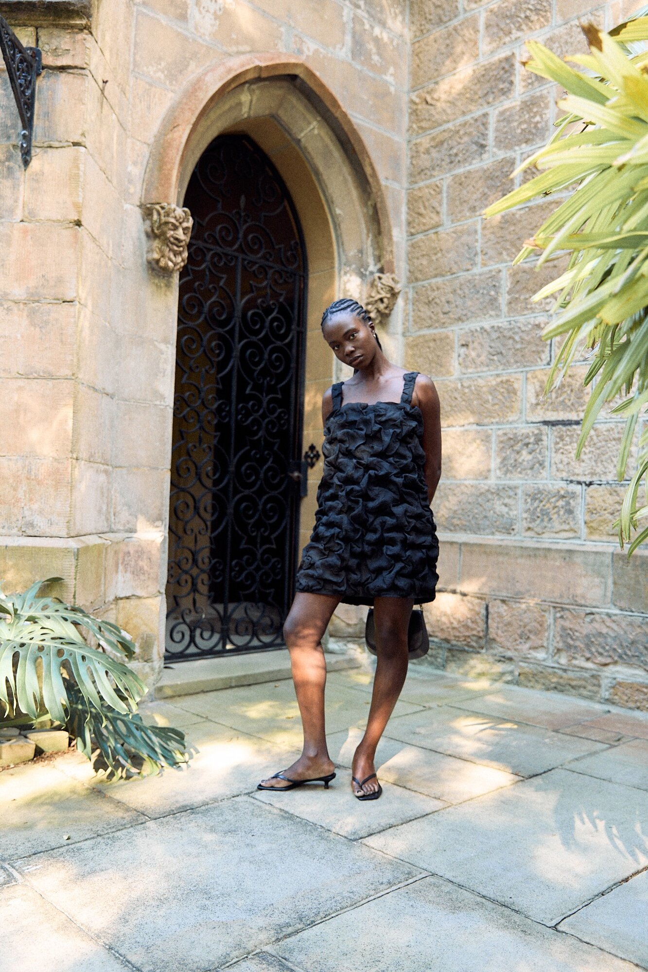 A sculptural ruched mini dress. 
