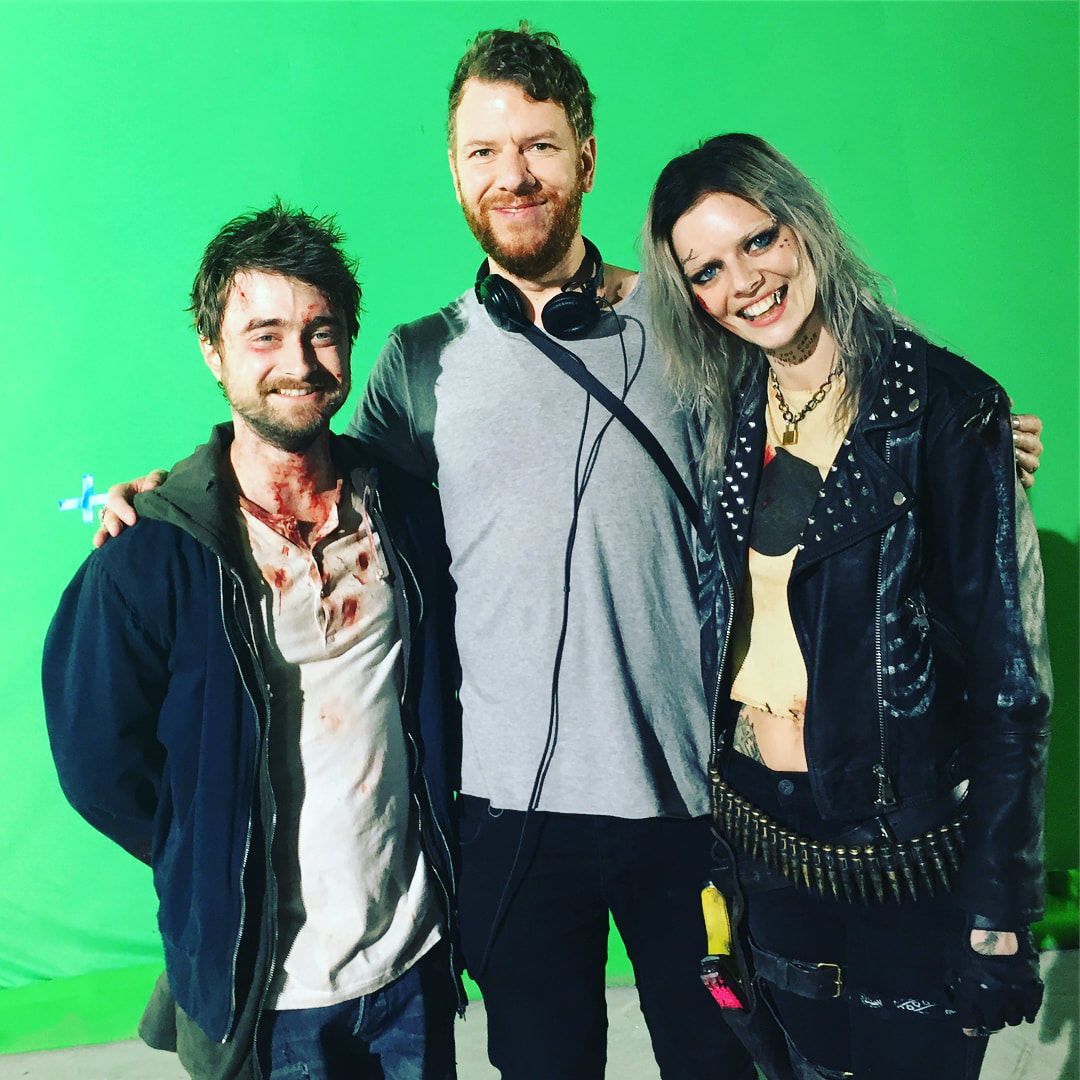 Jason Lei Howden with Guns Akimbo stars Daniel Radcliffe and Samantha Weaving. Photo / Supplied