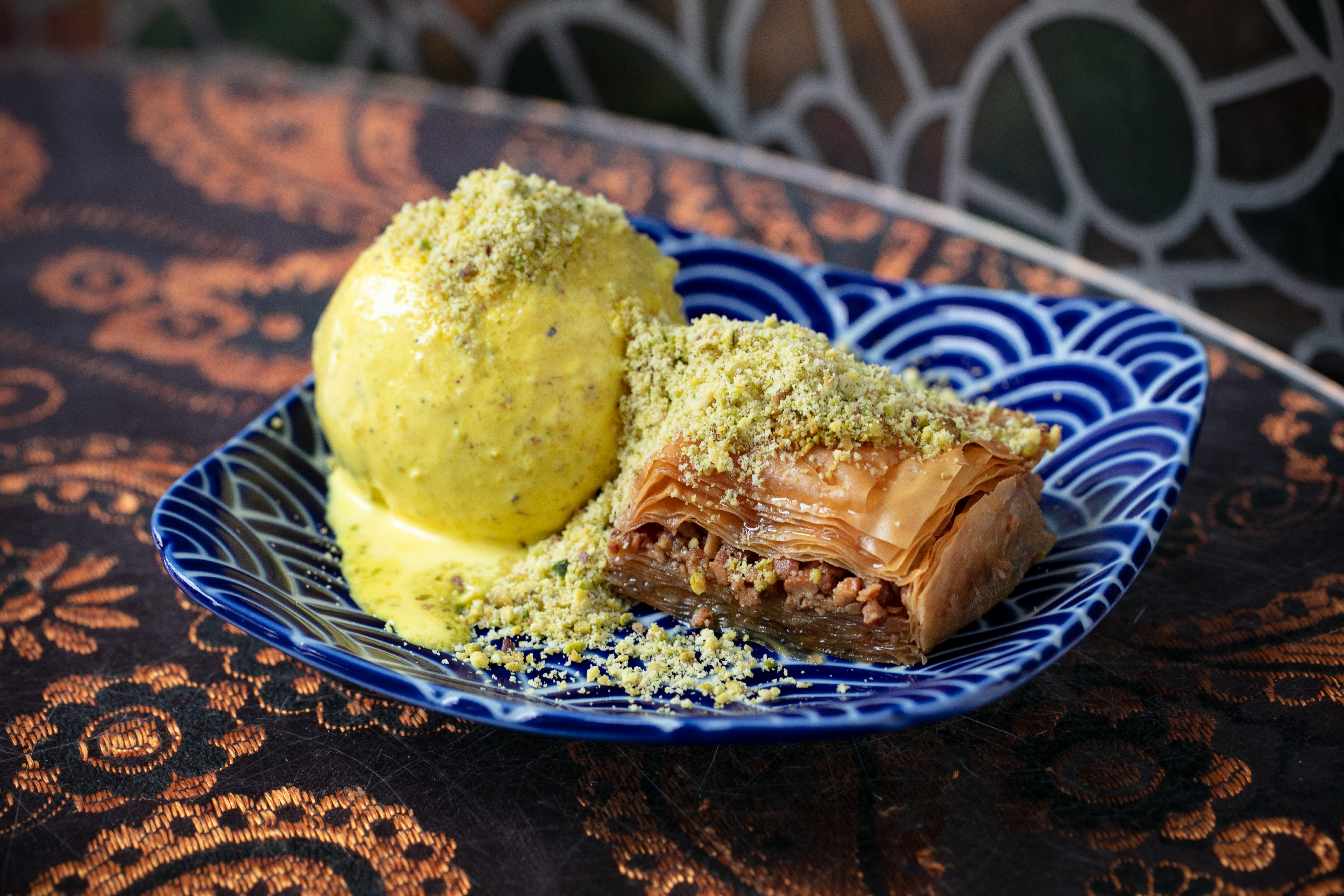 The saffron ice cream is paired with nutty, filo-flaky baklava. Photo / Babiche Martens