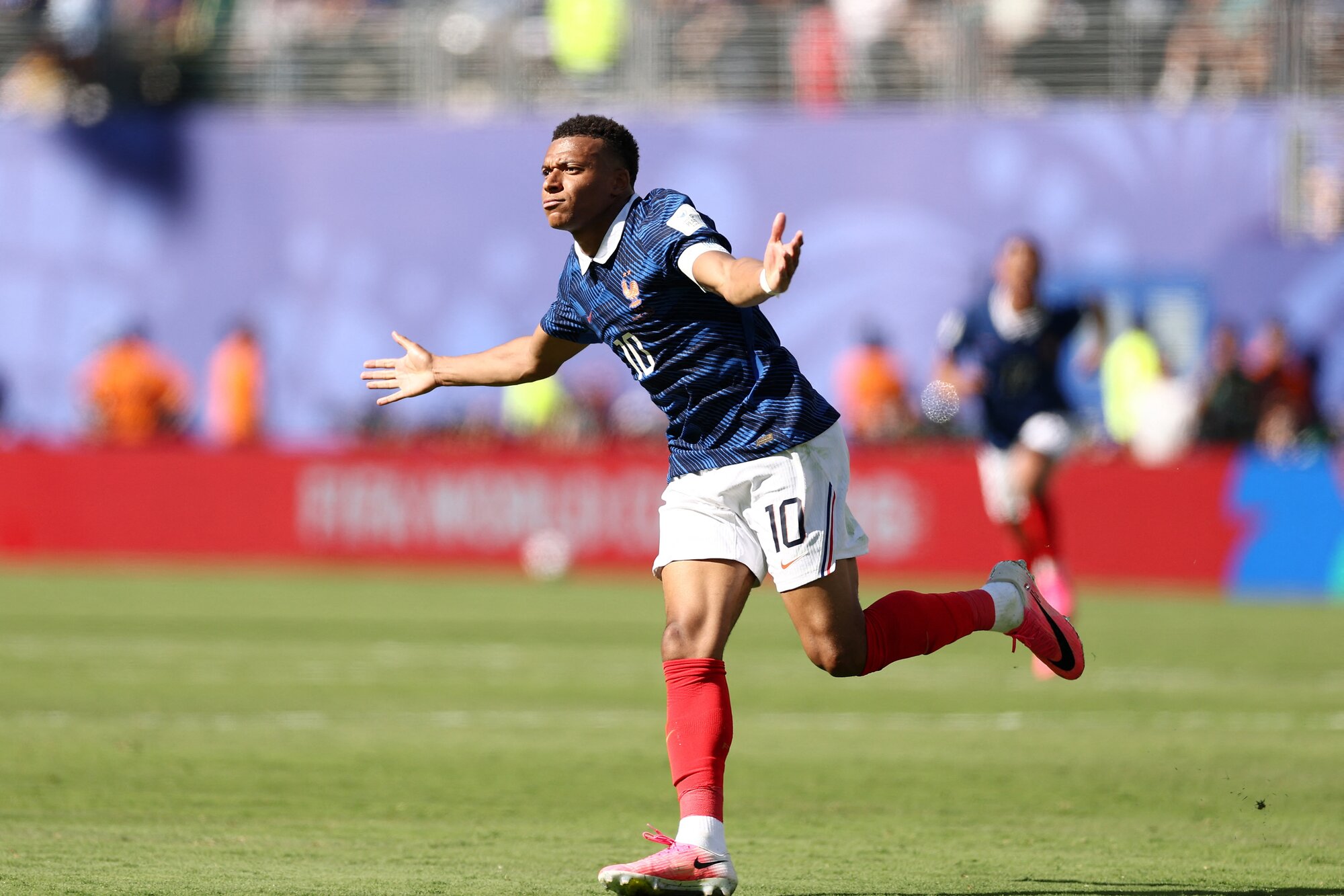 France's forward Kylian Mbappe celebrates after scoring against Senegal. Photo / AFP