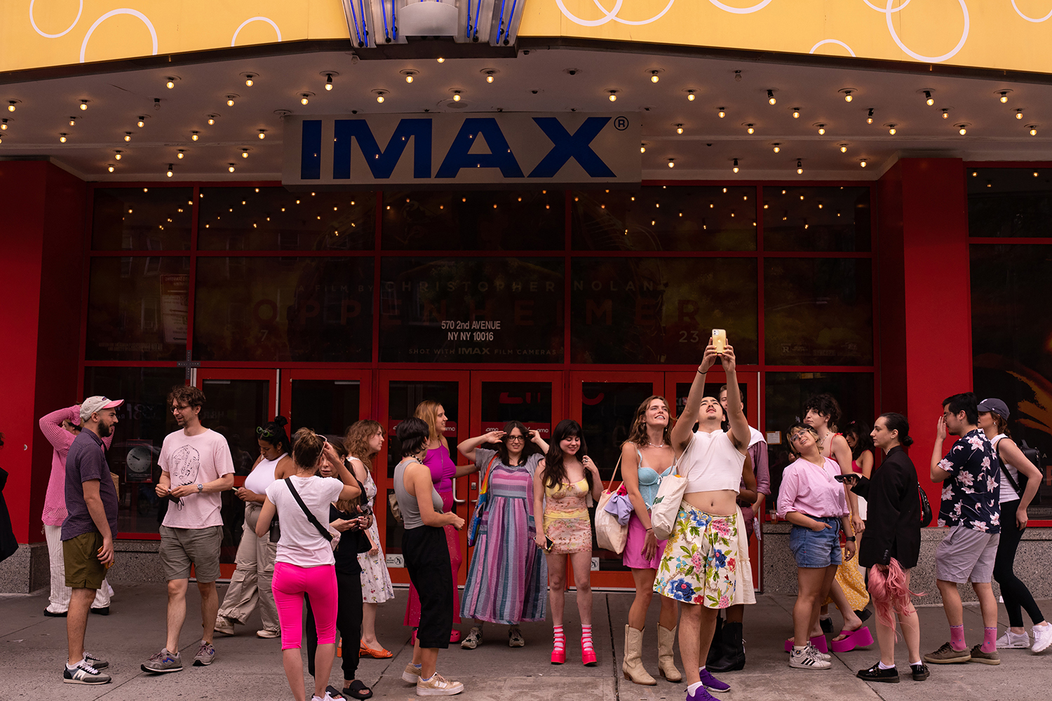 Moviegoers wear pink on opening day of ‘Barbie,’ outside a movie theatre in New York. Photo / Maansi Srivastava, The New York Times