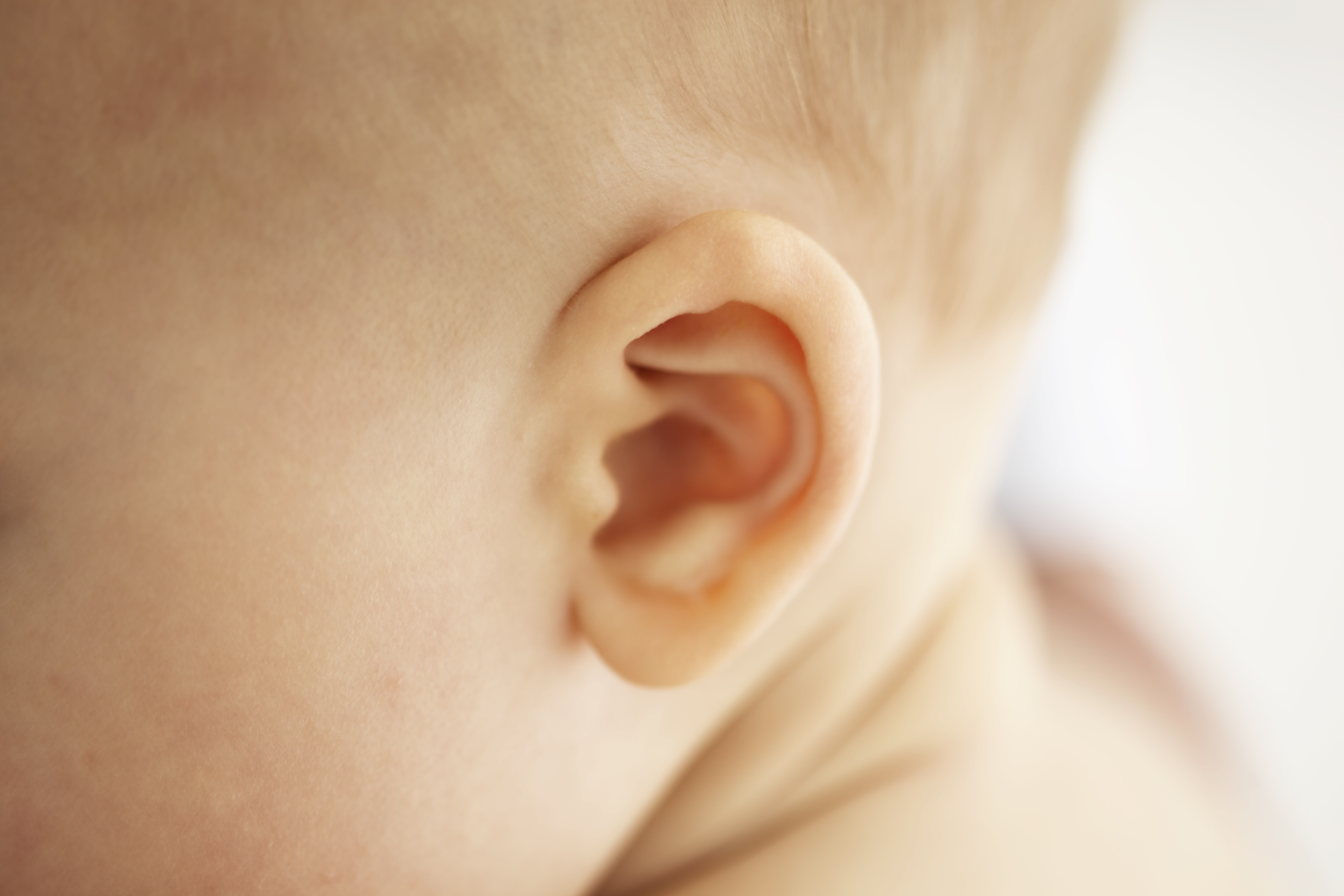 Easy fix: Baby's are prone to ear infections, and placing a few drops of breast milk at the entrance to their ear canal can help fight infection. Photo / Getty Images. 
