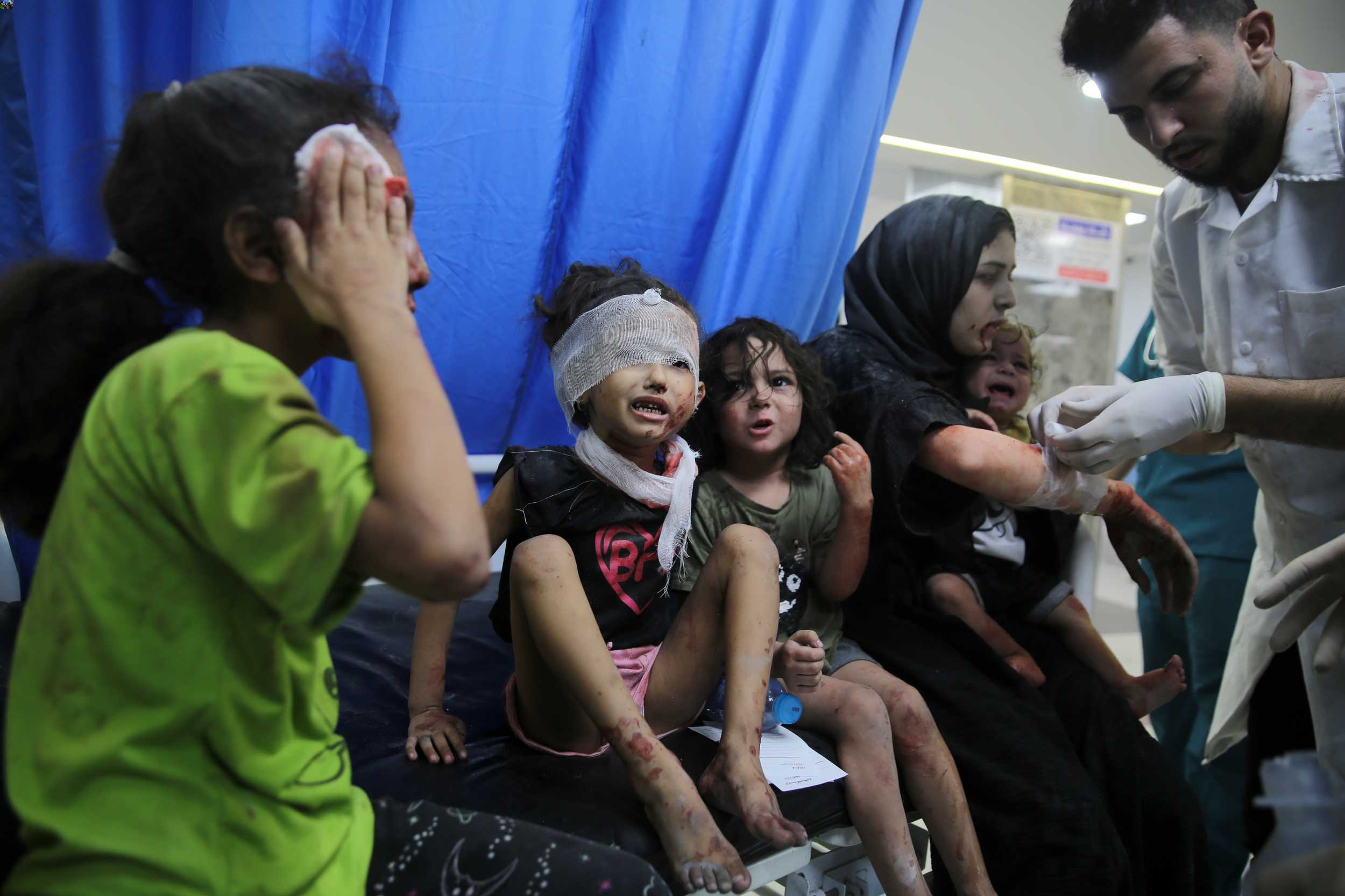 Shifa Hospital in Gaza City is struggling to cope with the numbers of injured and dead being brought in as Israeli bombardments continue. Photo / AP