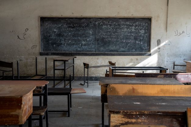 A classroom that previously was used for girls sits empty in Kabul after the Taliban ordered women nationwide to stop attending private and public universities. Now, they have also banned women from NGOs. Photo / AP