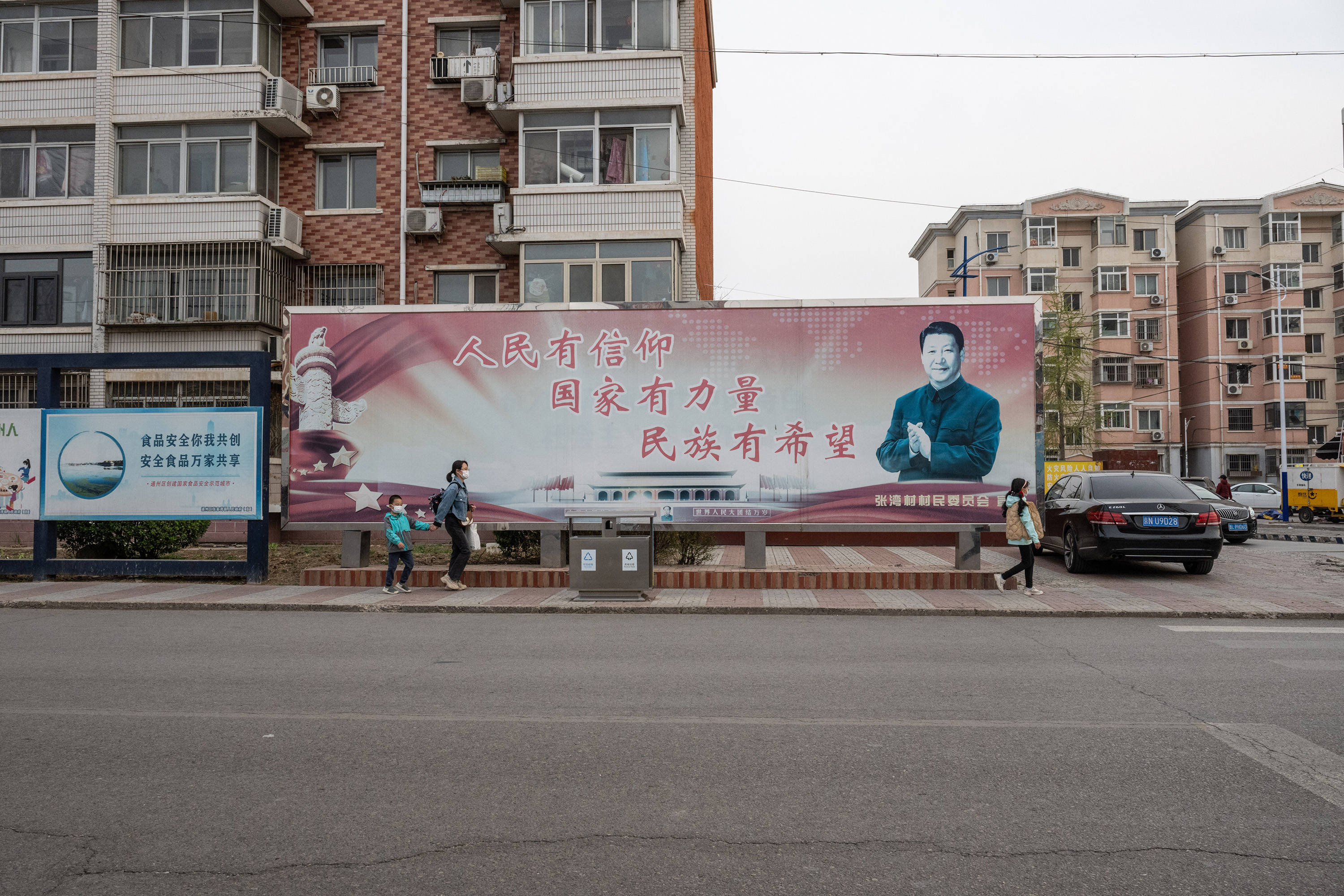 In Zhangjiawan, a faded propaganda poster showing President Xi Jinping and the slogan “People have faith, the country has power, there is hope for the nation.” Photo / Gilles Sabrié, The New York Times