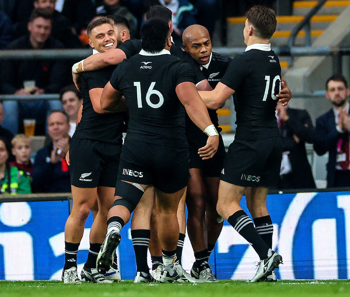 The All Blacks celebrate a Mark Tele'a try against England at Twickenham. Photo / Photosport