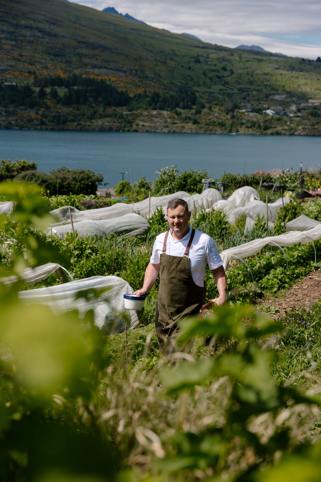 The Sherwood's head chef and co-owner Chris Scott, pictured in the hotel's garden overlooking Queenstown's Lake Wakatipu. Photo / Supplied