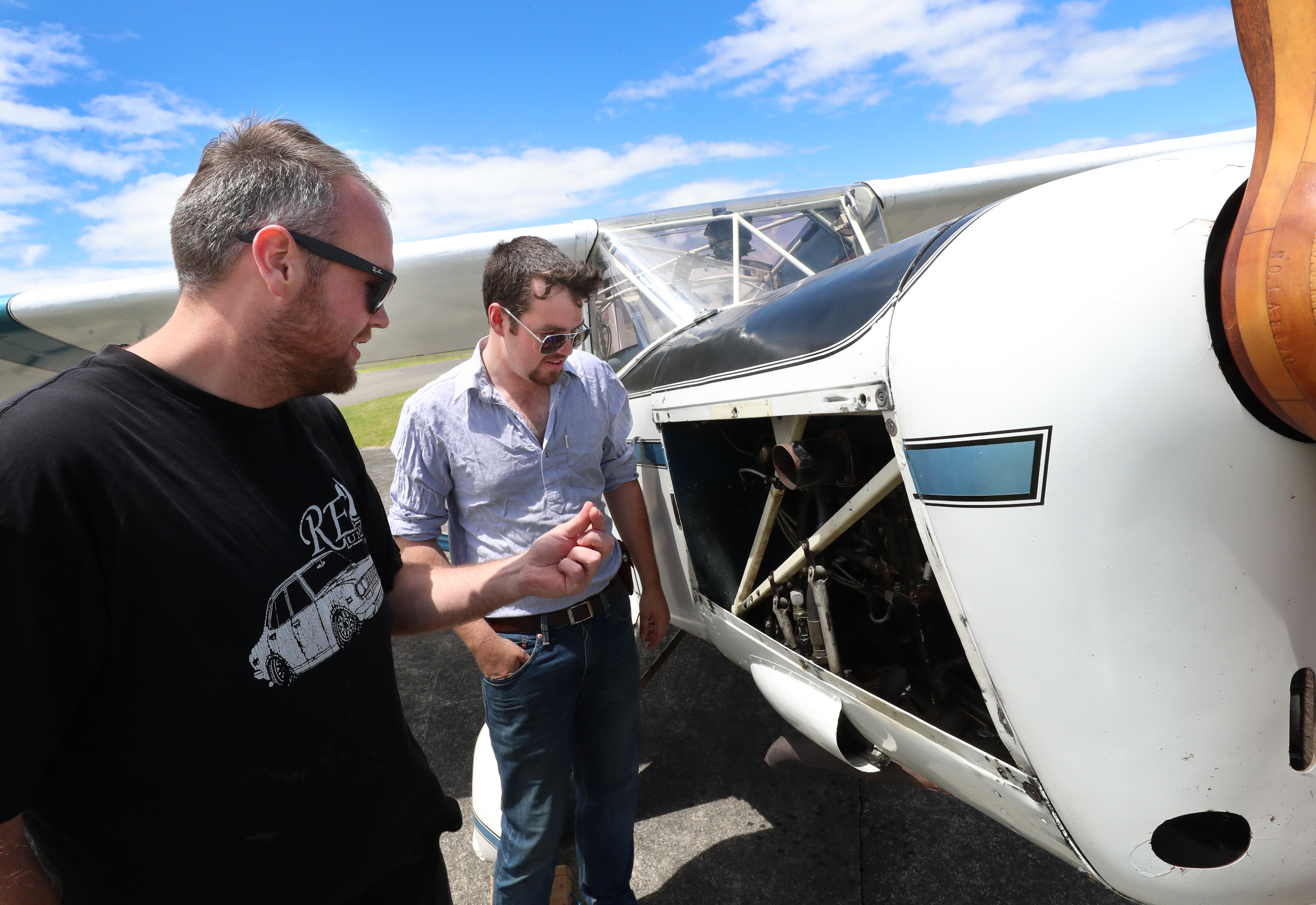 Jonathan Mauchline (right) with fellow aero club instructor Tom Martin at Whanganui Airport. Photo / Bevan Conley