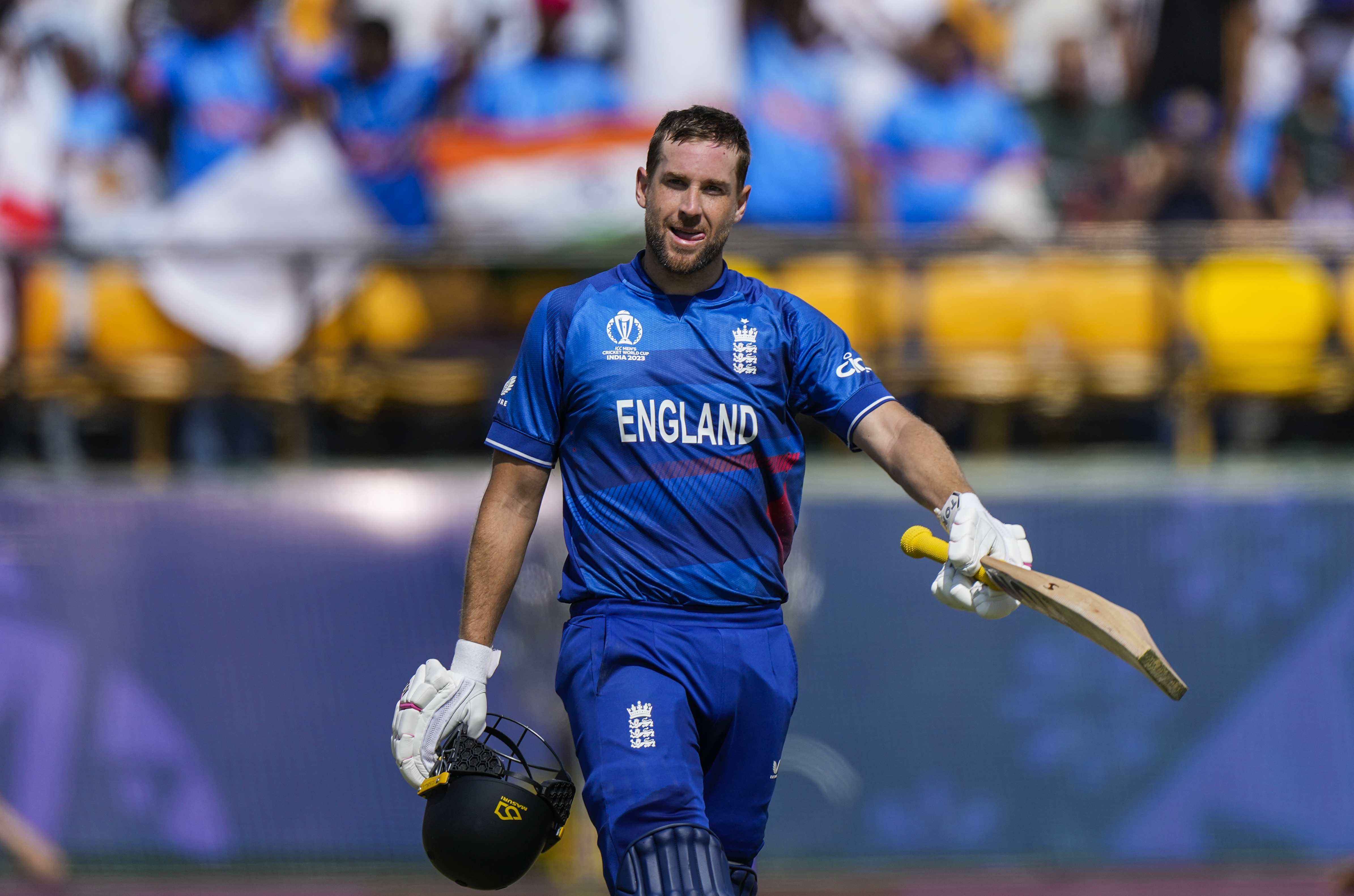 England's Dawid Malan,celebrates his century during the ICC Men's Cricket World Cup match between England and Bangladesh in Dharamshala. Photo  / AP