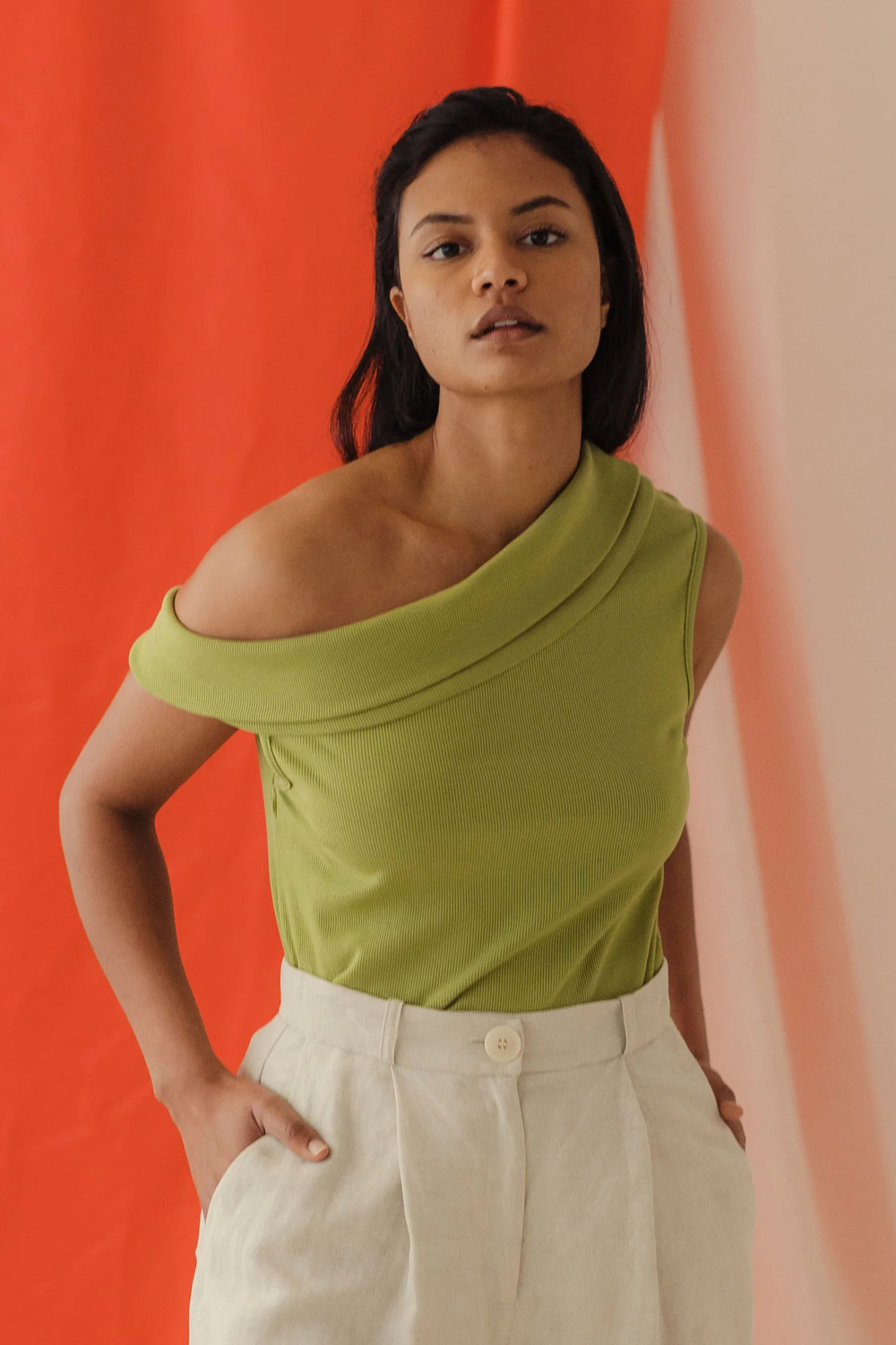 Mina’s Edun knit top in the revivifying shade ‘avocado’.
