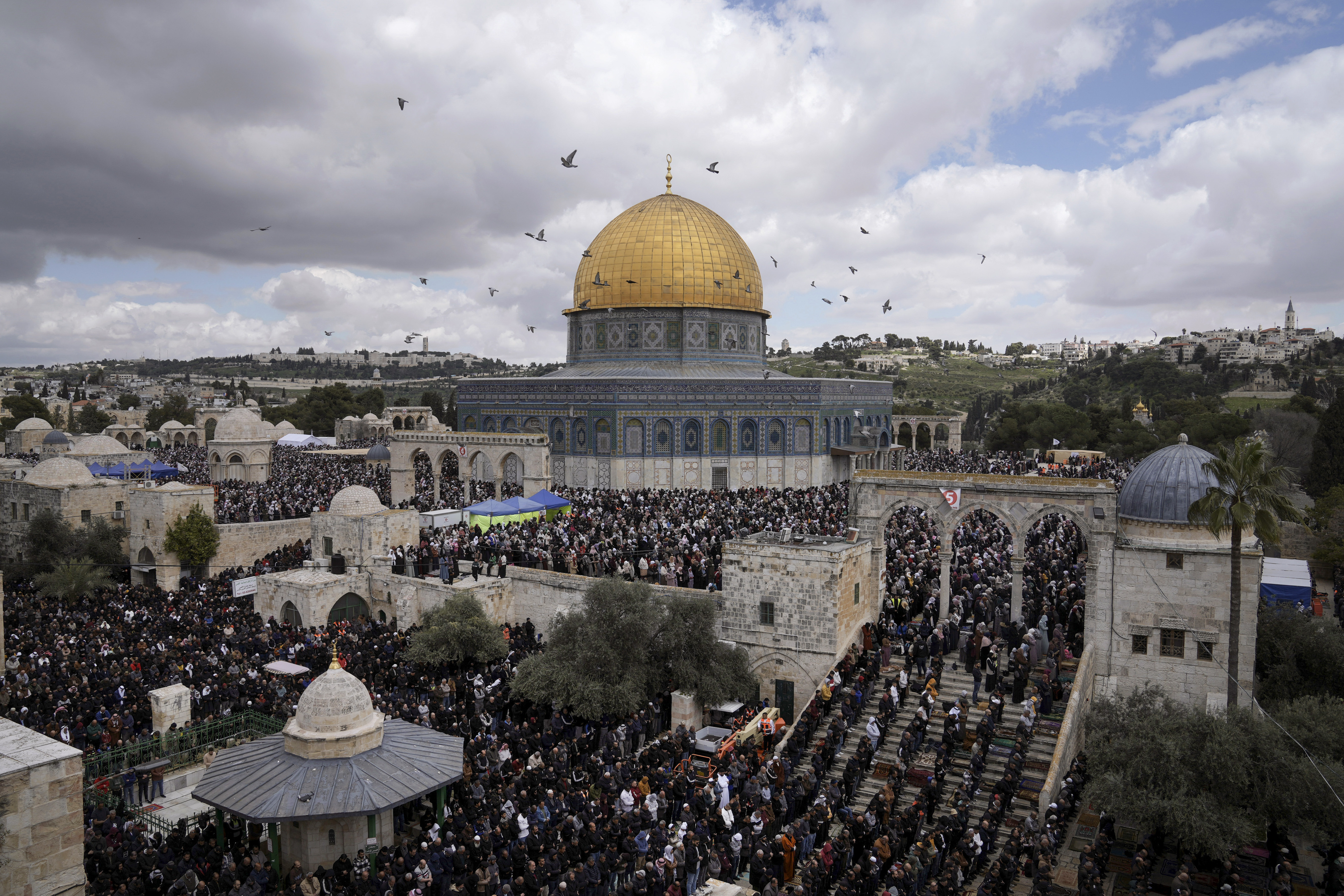 Muslim worshippers perform Friday prayers outside the Dome of Rock Mosque at the Al-Aqsa Mosque compound in the Old City of Jerusalem during the Muslim holy month of Ramadan, March 31, 2023. Photo / AP