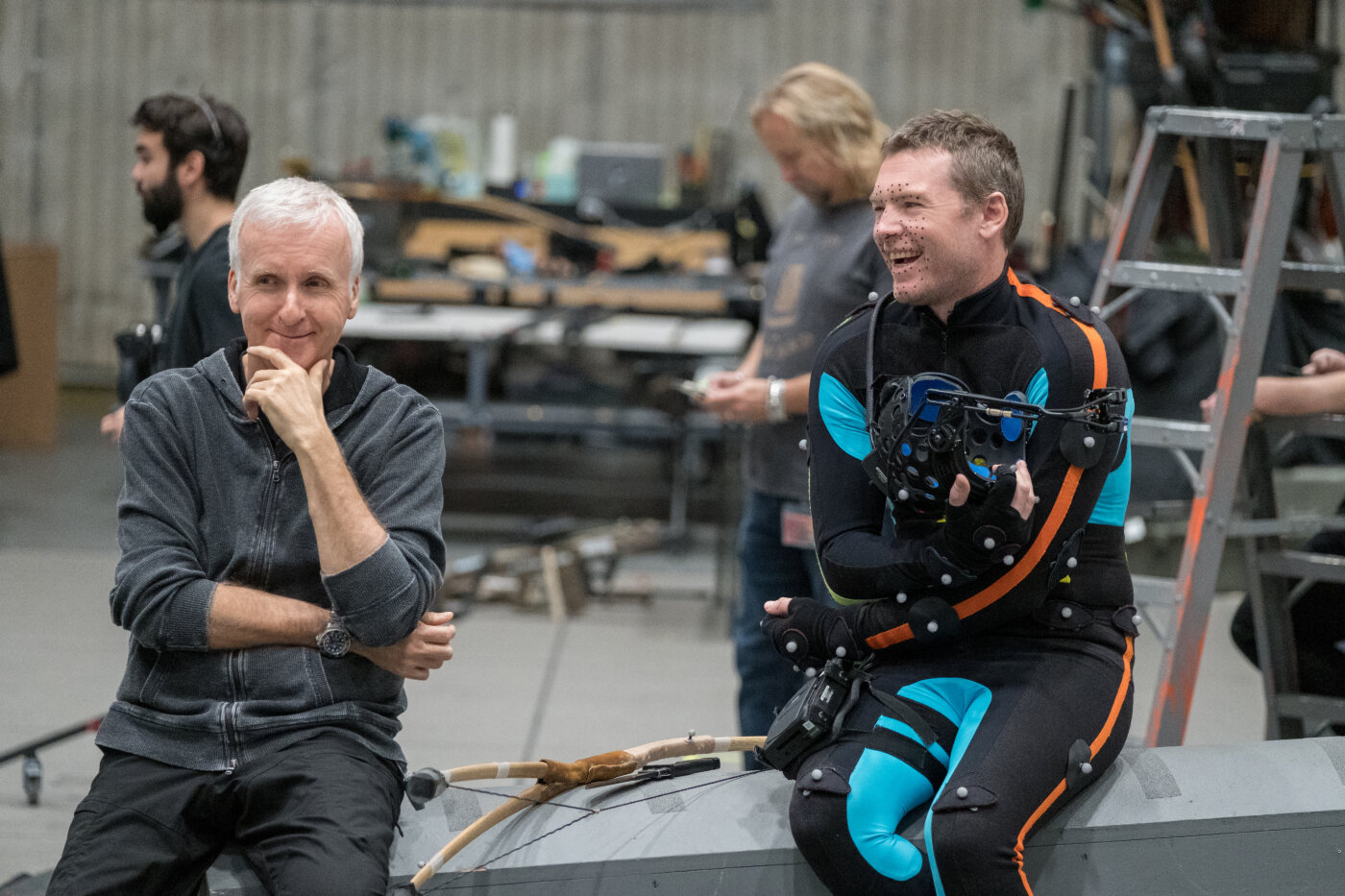 James Cameron with actor Sam Worthington behind the scenes of Avatar 2. 