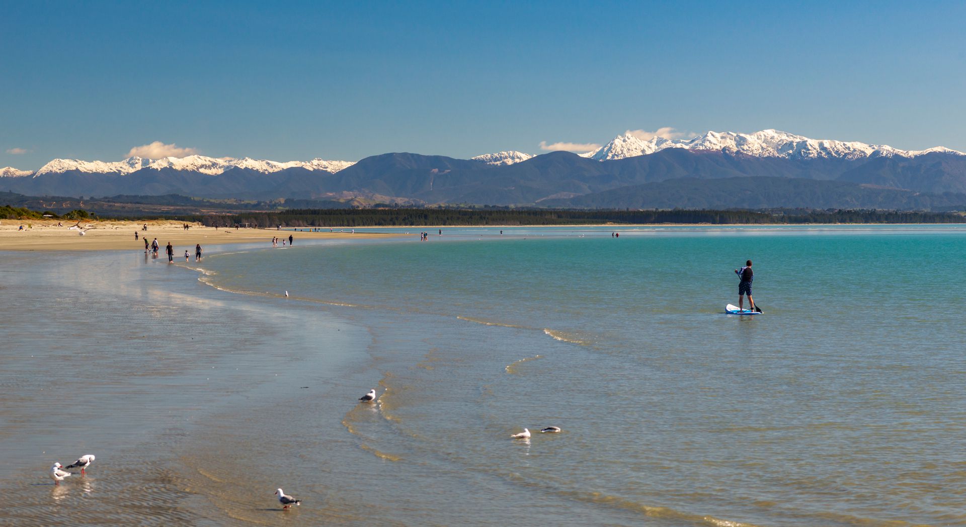Whether paddling to you means a dip in the sea, SUP boarding or sea kayaking, you can have a go at Tahunanui Beach. Photo / nelsontasman.nz