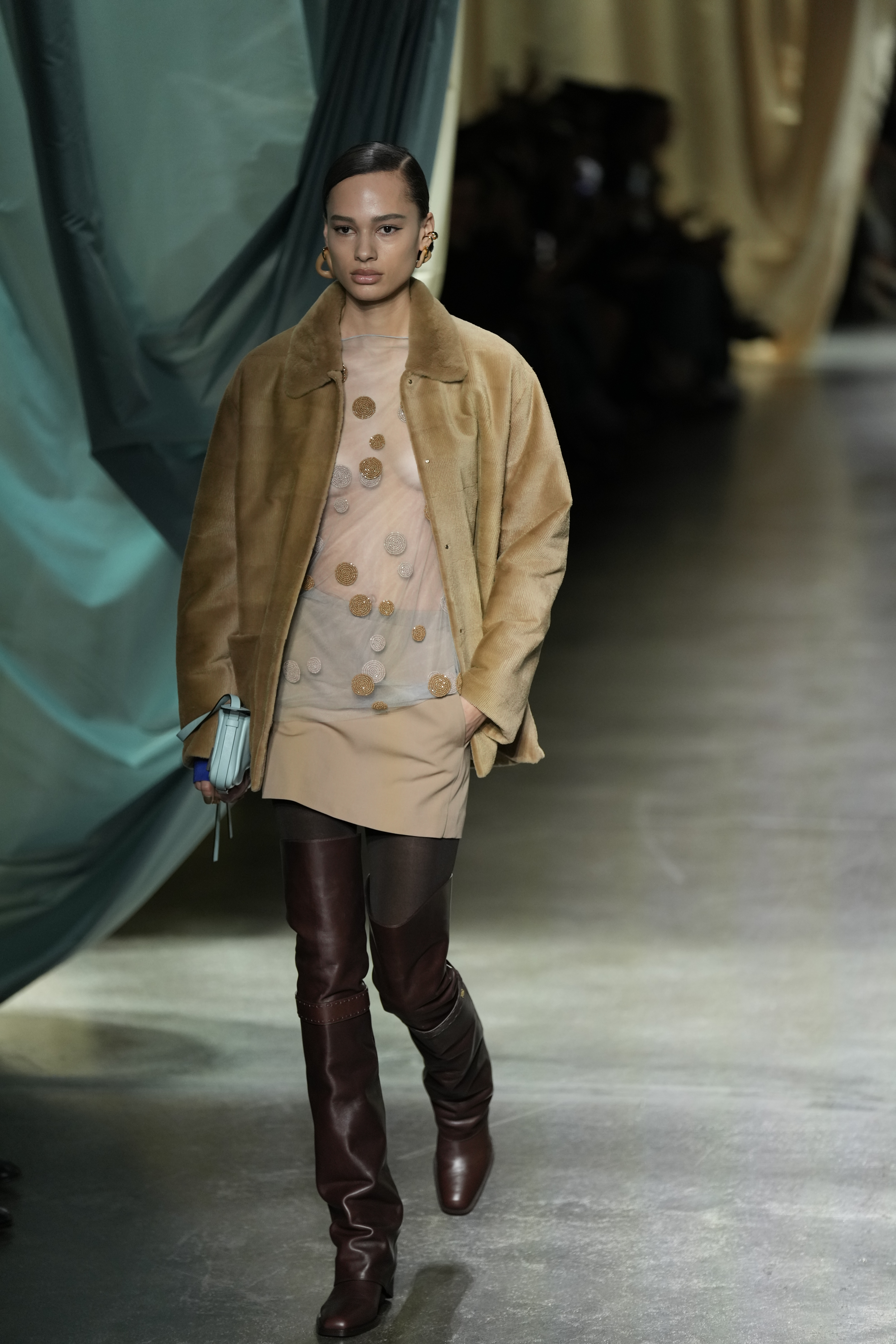 Fendi's collection featured a luxurious range of textiles but minimal logos. Photo / AP