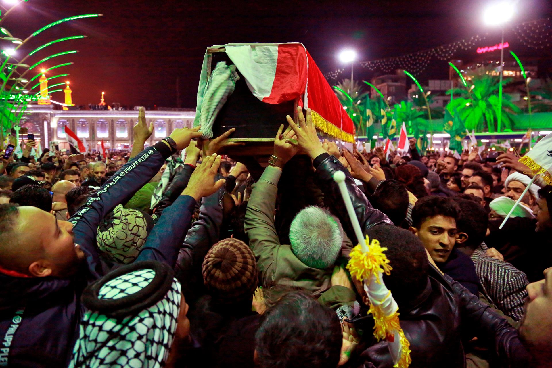 Mourners carry the coffins of Iran's top general Qassem Soleimani and Abu Mahdi al-Muhandis, deputy commander of Iran-backed militias in Iraq known as the Popular Mobilization Forces. Photo / AP