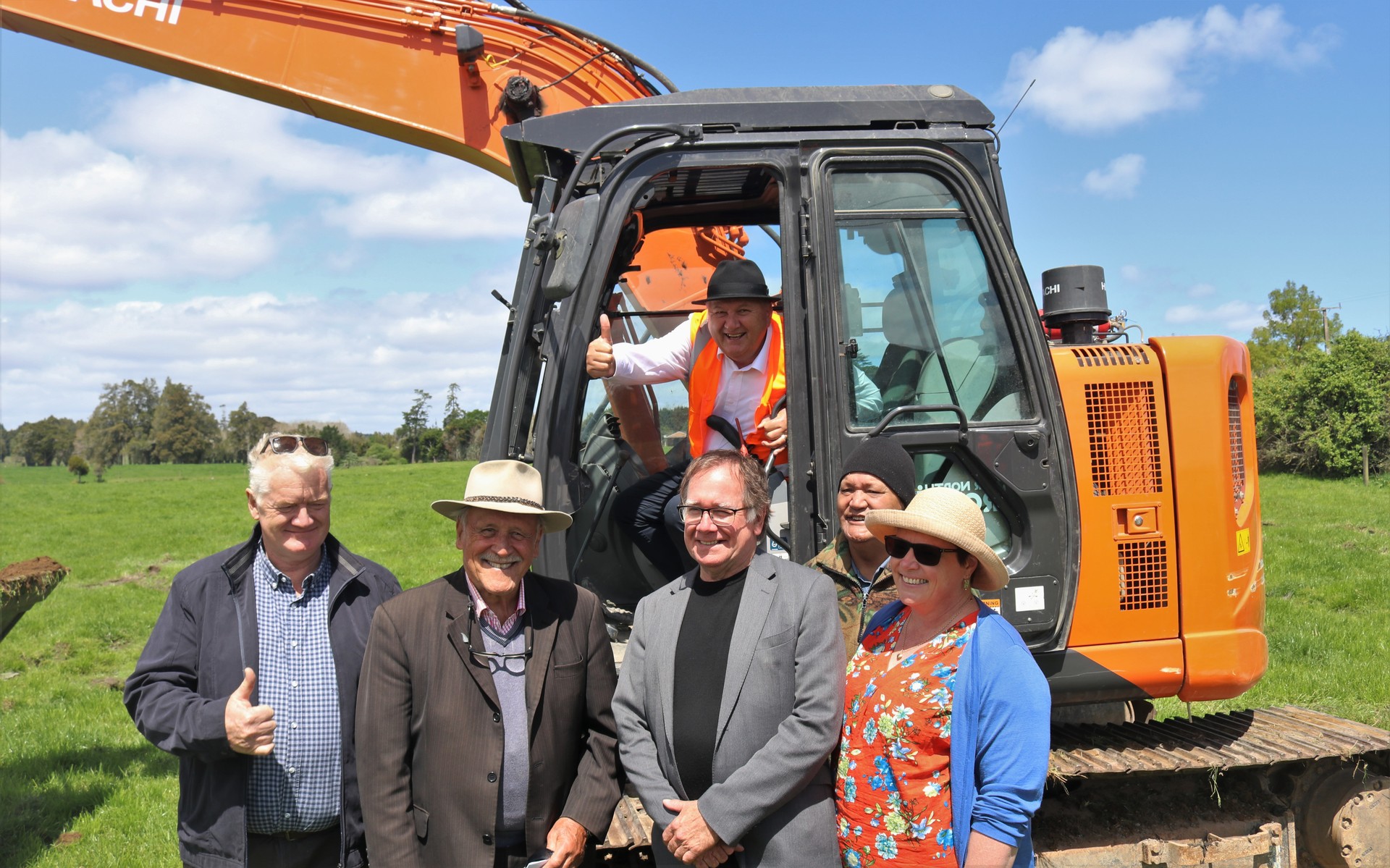Regional Economic Development Minister Shane Jones after his turn in the digger with Tai Tokerau Water trustees, from left, Ken Rintoul, Dover Samuels, Murray McCully, Collin Rameka and Kathryn de Bruin. Photo / Peter de Graaf