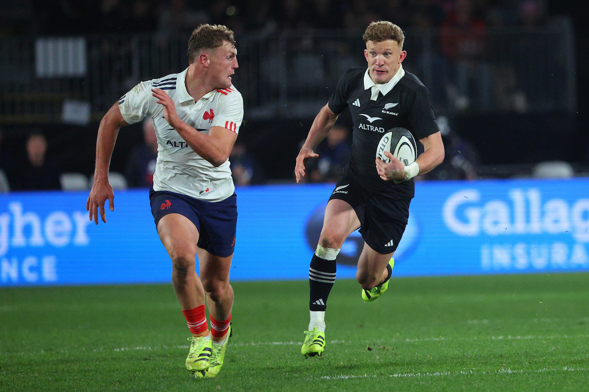 Damian McKenzie makes a break against France. Photo / Photosport