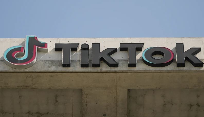 A TikTok sign is displayed on their building in Culver City, Calif., March 11, 2024. (AP Photo/Damian Dovarganes, File)