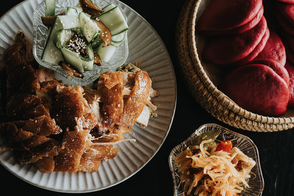 Specialties at Nanam include Taco Pao, hand-rolled beetroot buns served with sticky pork belly, an assortment of condiments and
pickles. Photo / Vincent Wu