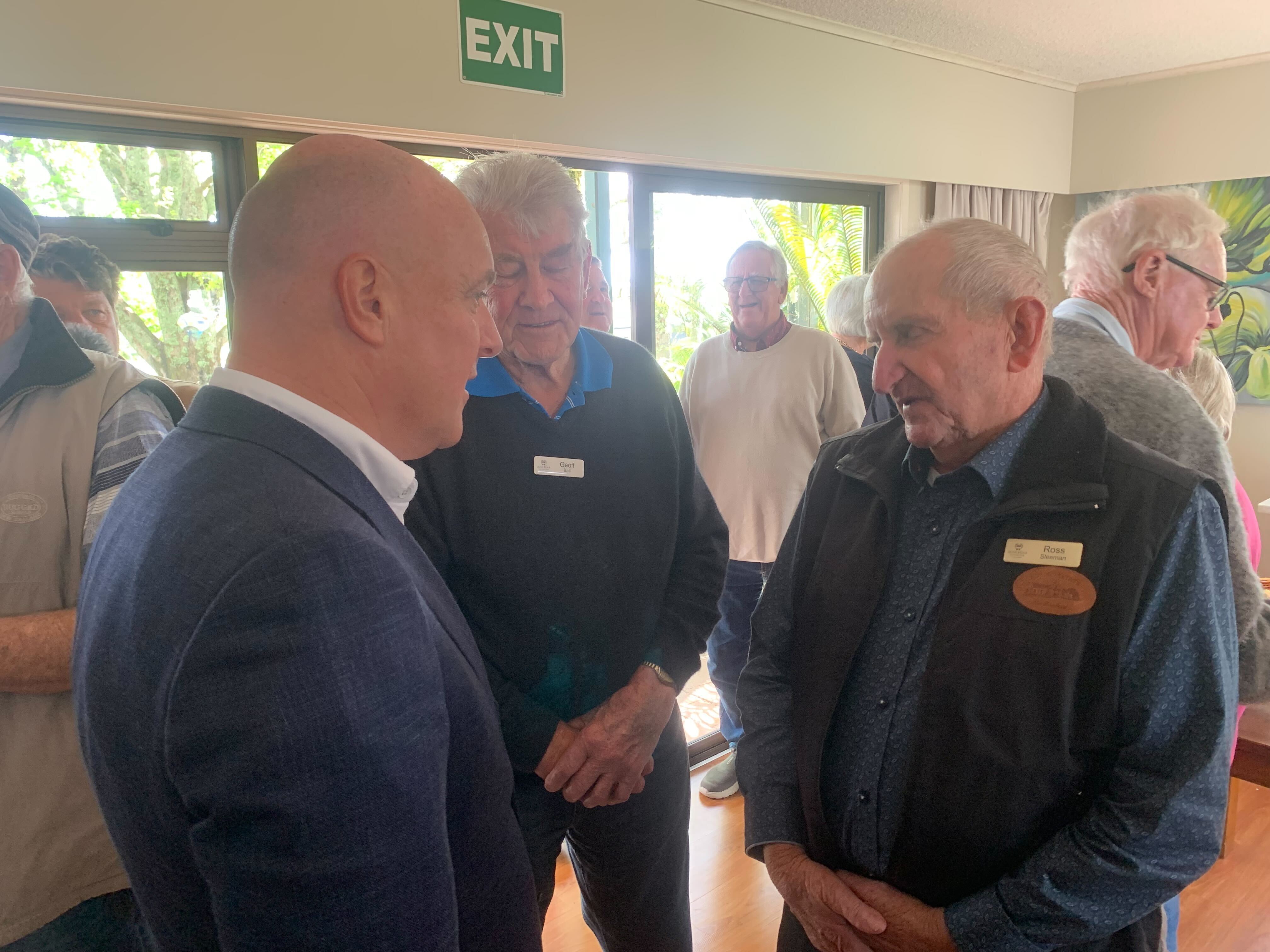 National leader Christopher Luxon talks to residents at a Kerikeri retirement village about his party working with NZ First. Photo / Adam Pearse