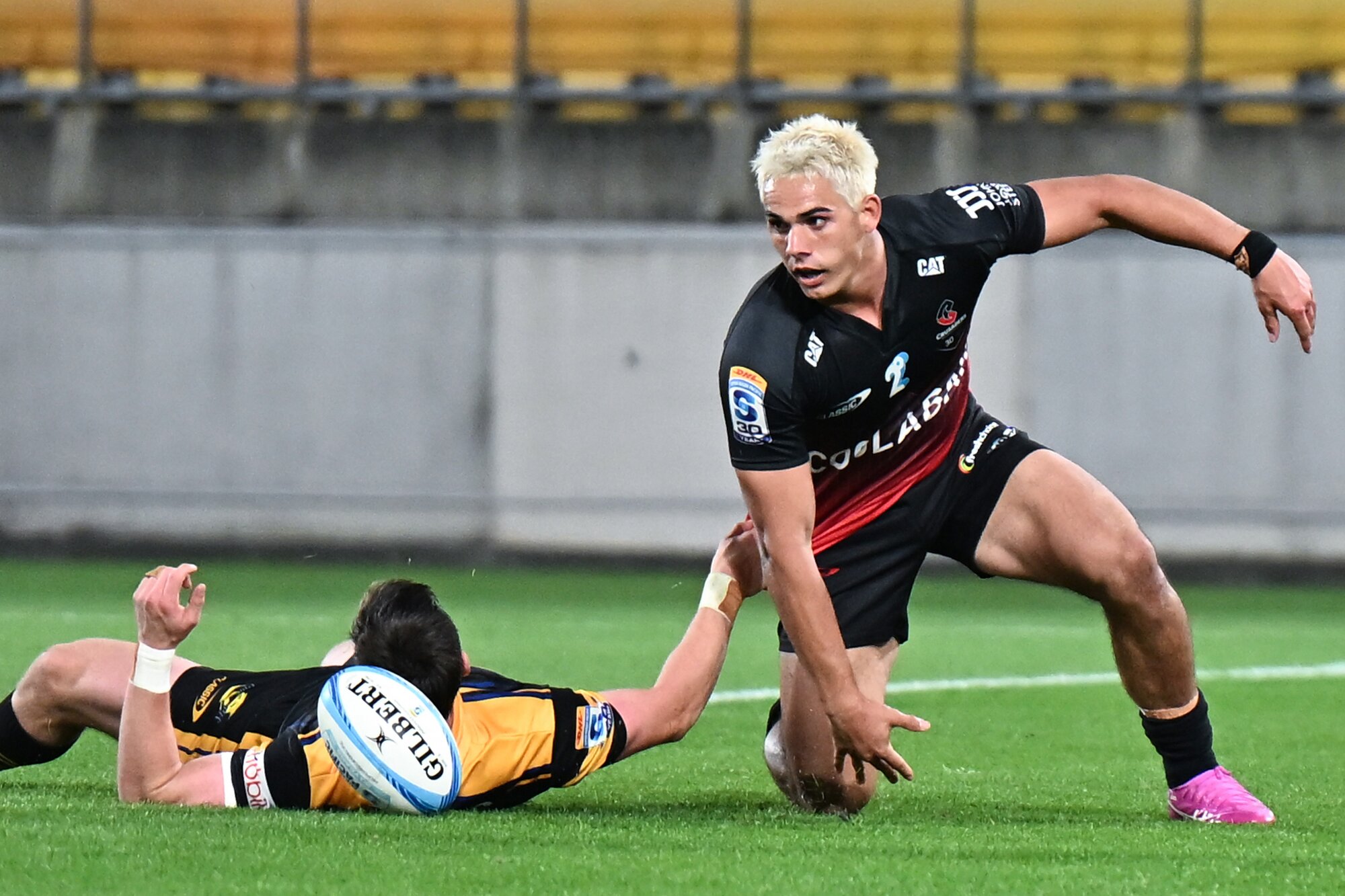 Crusaders halfback Noah Hotham scores against the Hurricanes. Photo / Photosport