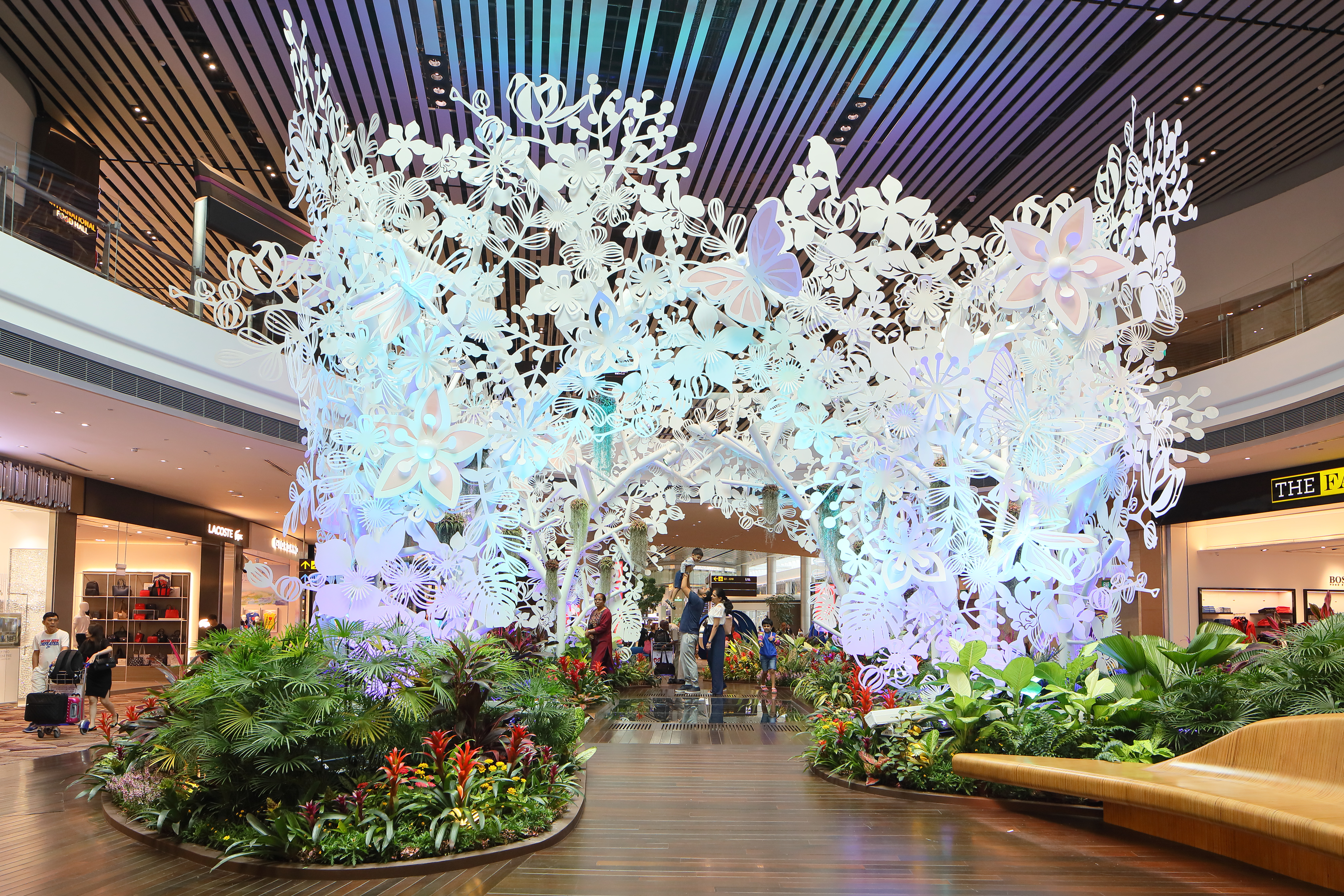 There are multiple art installations across the four terminals, including the Kinetic Rain in T1, Crystal Clouds at the Jewel, and Petalclouds at T4. Photo / Supplied