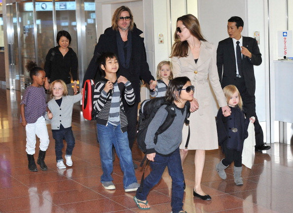 Brad Pitt, Angelina Jolie and their six children Maddox, Pax, Zahara, Shiloh, Knox, and Vivienne arrive at Haneda International Airport in Tokyo, Japan in November 2011. Photo / Getty Images
