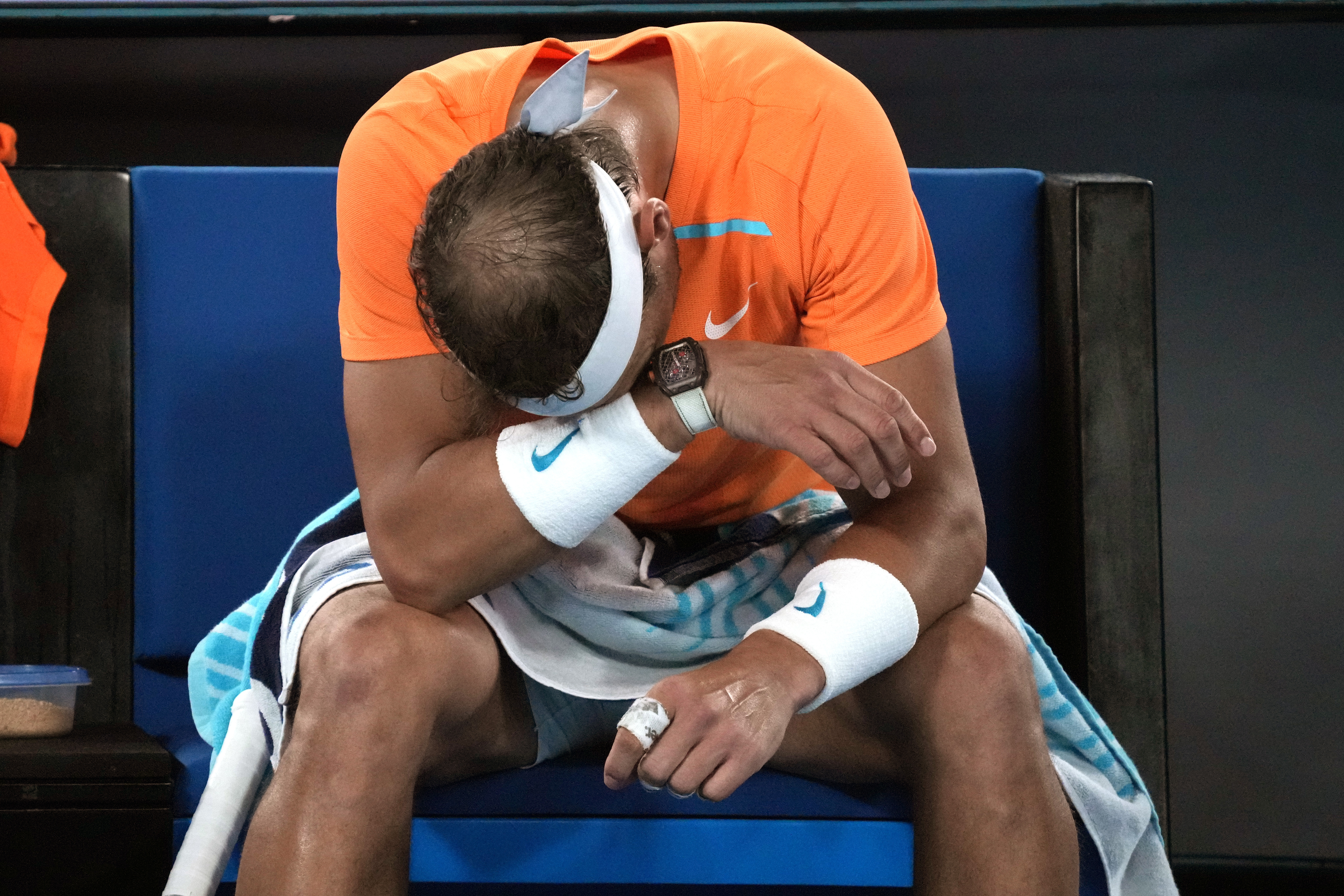 Rafael Nadal reacts during his second round loss to Mackenzie McDonald. Photo / AP
