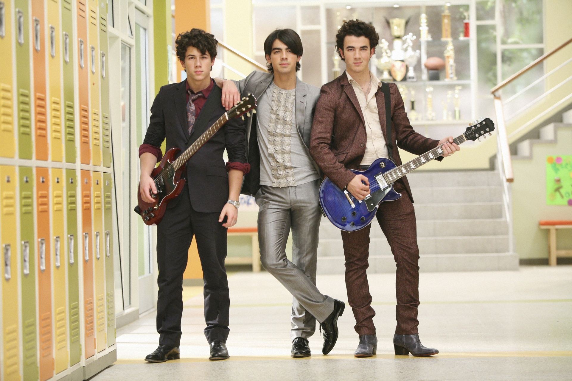 The Jonas Brothers, from left, Nick, Joe and Kevin perform during