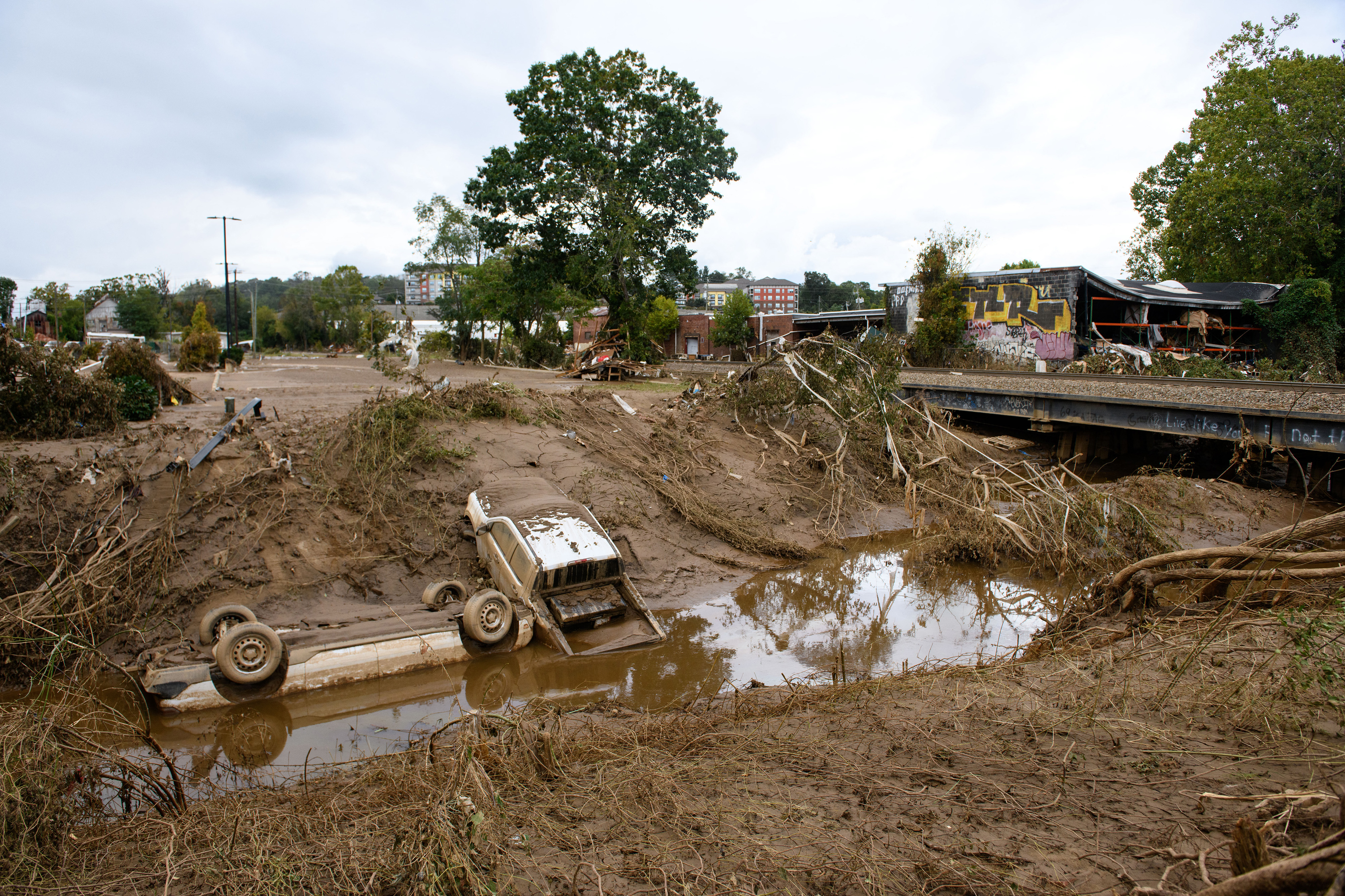 Destroyed cars lay in water at the Biltmore Village in the aftermath of Hurricane Helene in Asheville, North Carolina. Photo / Getty Images via AFP